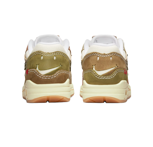Back view of two sneakers with smiley face and stitching details, one in light green and the other in tan, against a white background.
