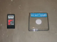 Electronic moisture meters (left) measure the moisture content and internal relative humidity of concrete, while calcium chloride kits (right) measure moisture vapor transmission.