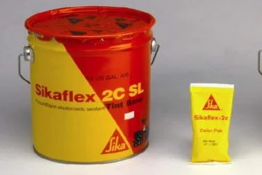 Sikaflex 2C is a high quality elastomeric joint sealant from Sika Corp, the world leader in construction sealant and adhesives. 2C is self-leveling and can be mixed with the small yellow color pack shown here for custom coloring.