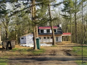 New two-story home being built on a beautiful wooded lot near Saugatuck, Michigan. The owners decided on decorative concrete flooring for the main level and consulted us about the best system.