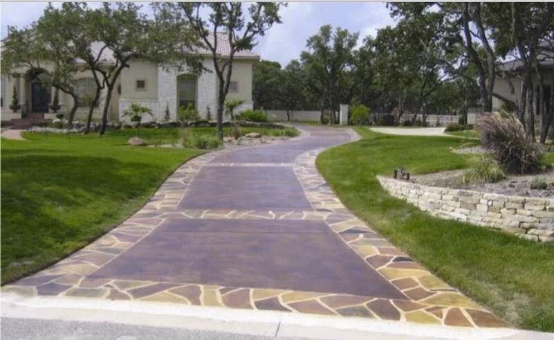 Stained Concrete Driveway Rocks.JPG
