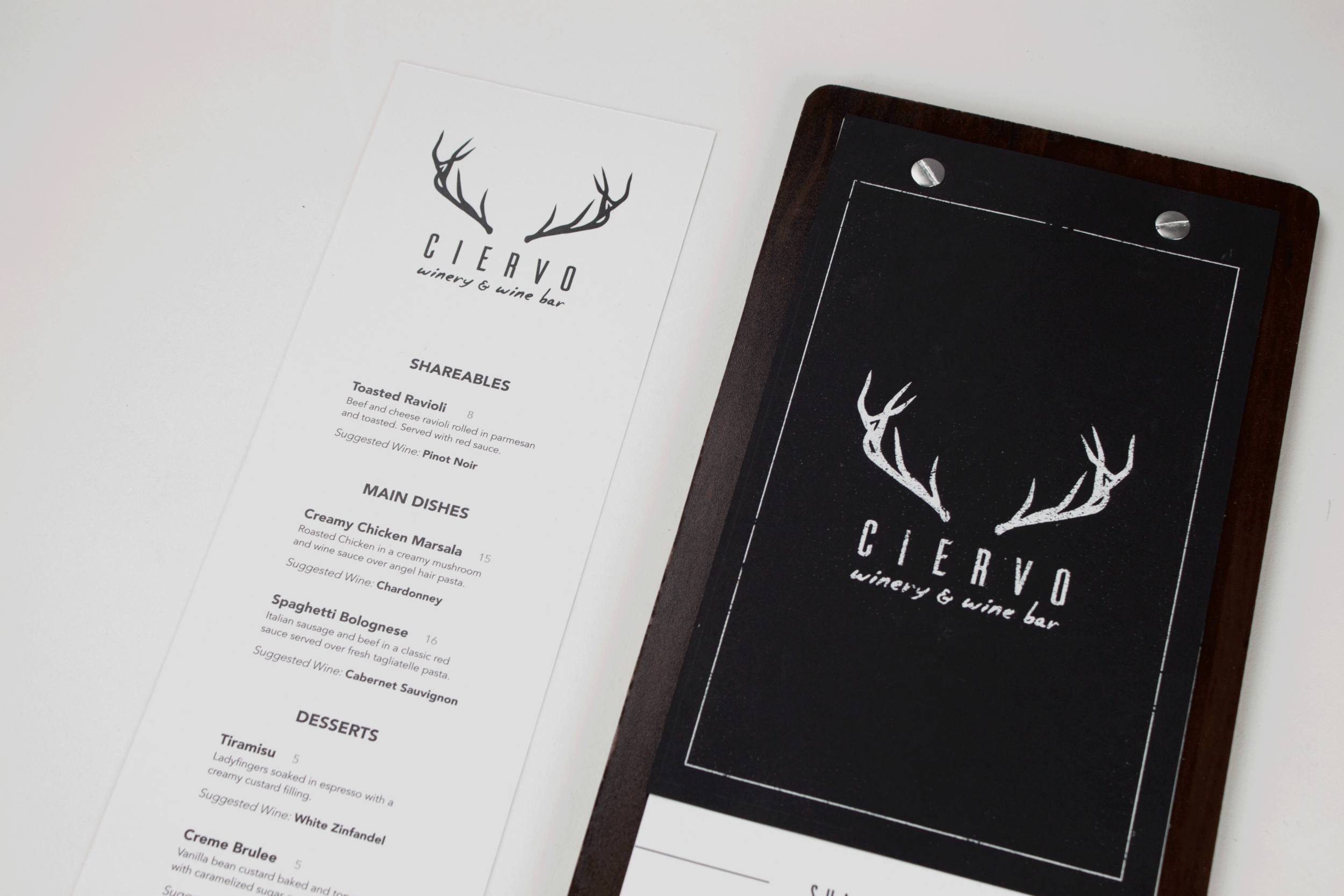 Food and Specials menus featuring the bold typography and the Ciervo logo.
