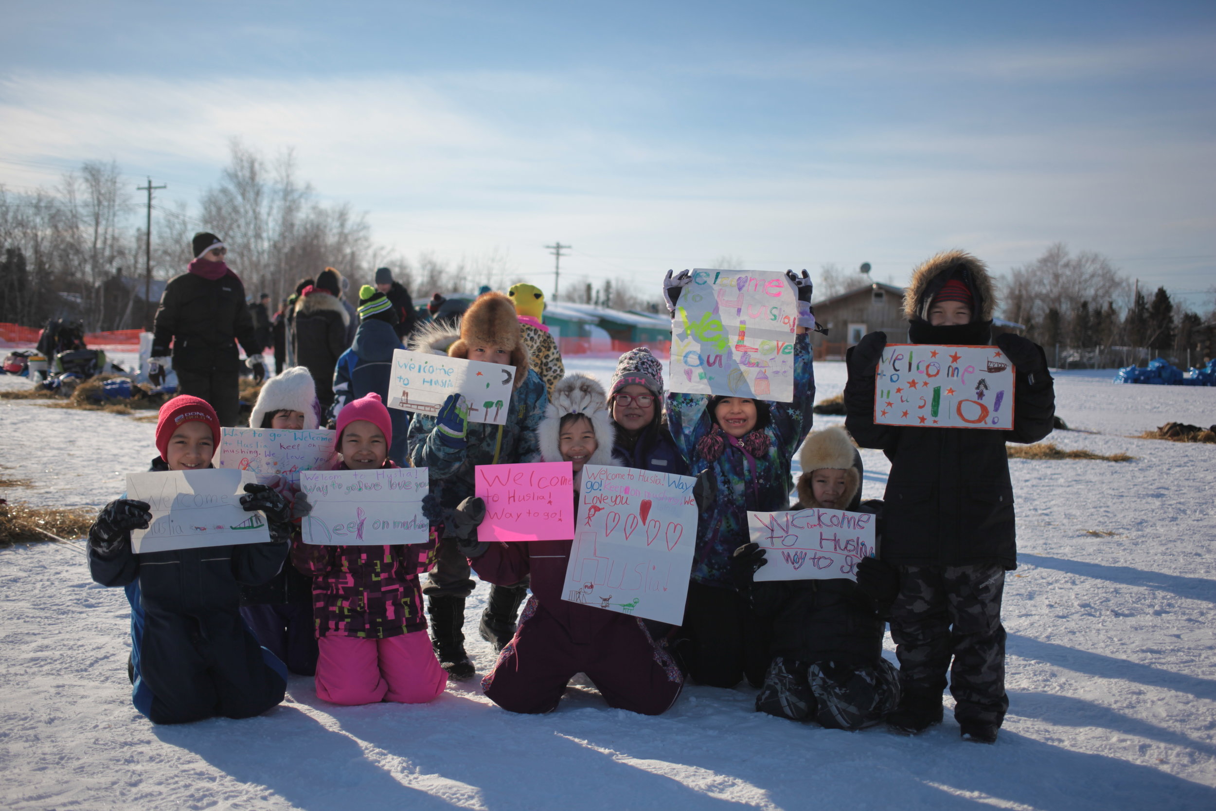 Huslia students welcome Iditarod Racers to Huslia Checkpoint, March 2017