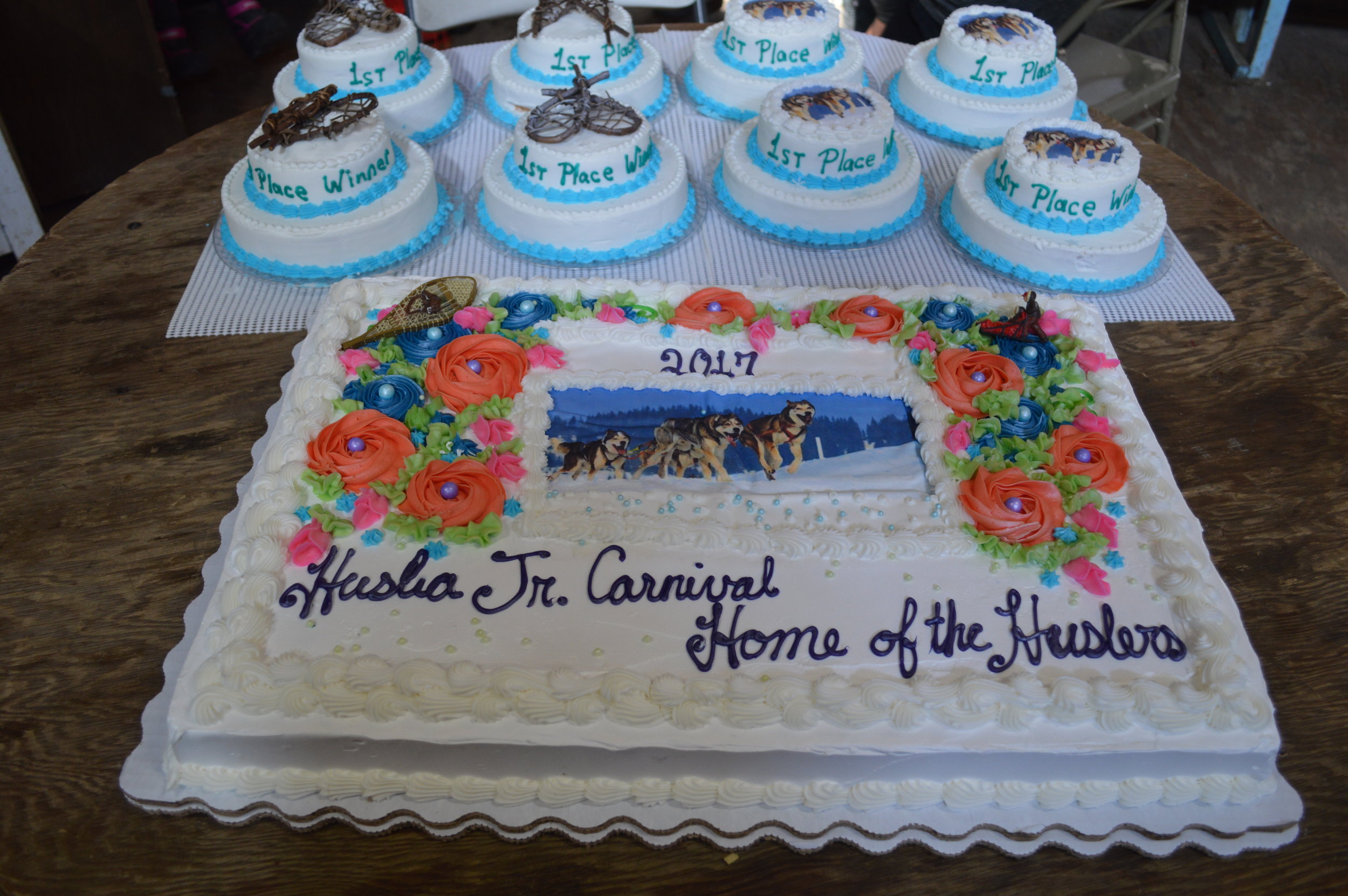 Huslia Jr. Carnival - Community Cake and cakes for 1st Place competition winners .