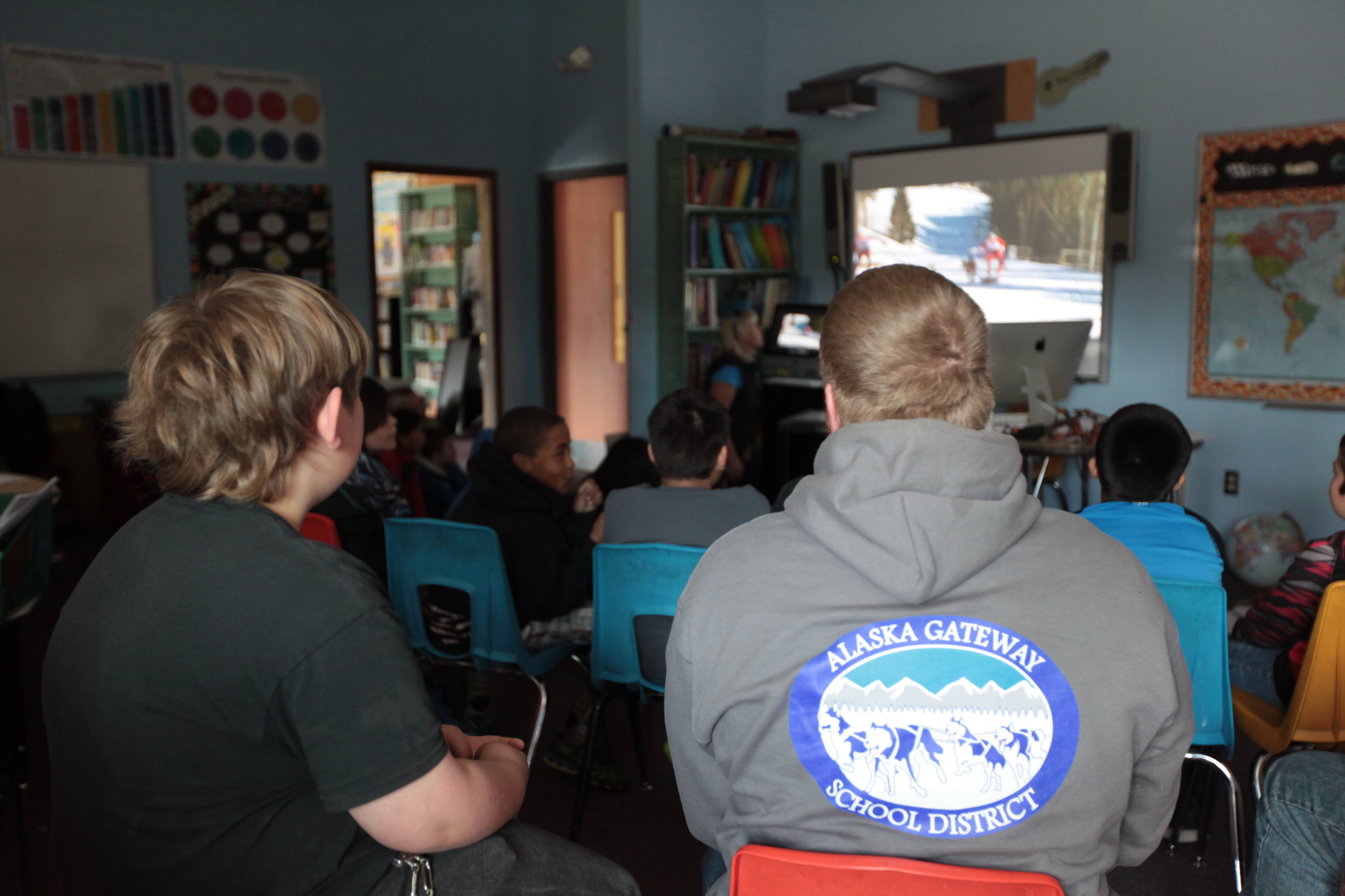 Eagle & Tanacross students listen to Quest guest speaker in classroom.