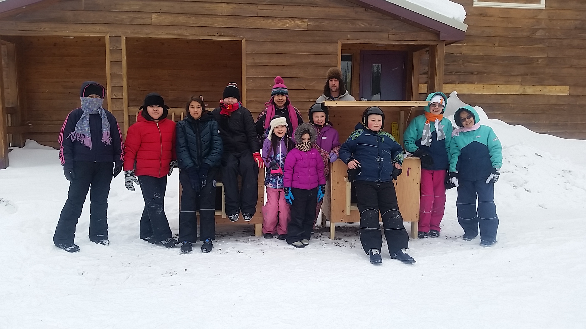 Students with dog house.