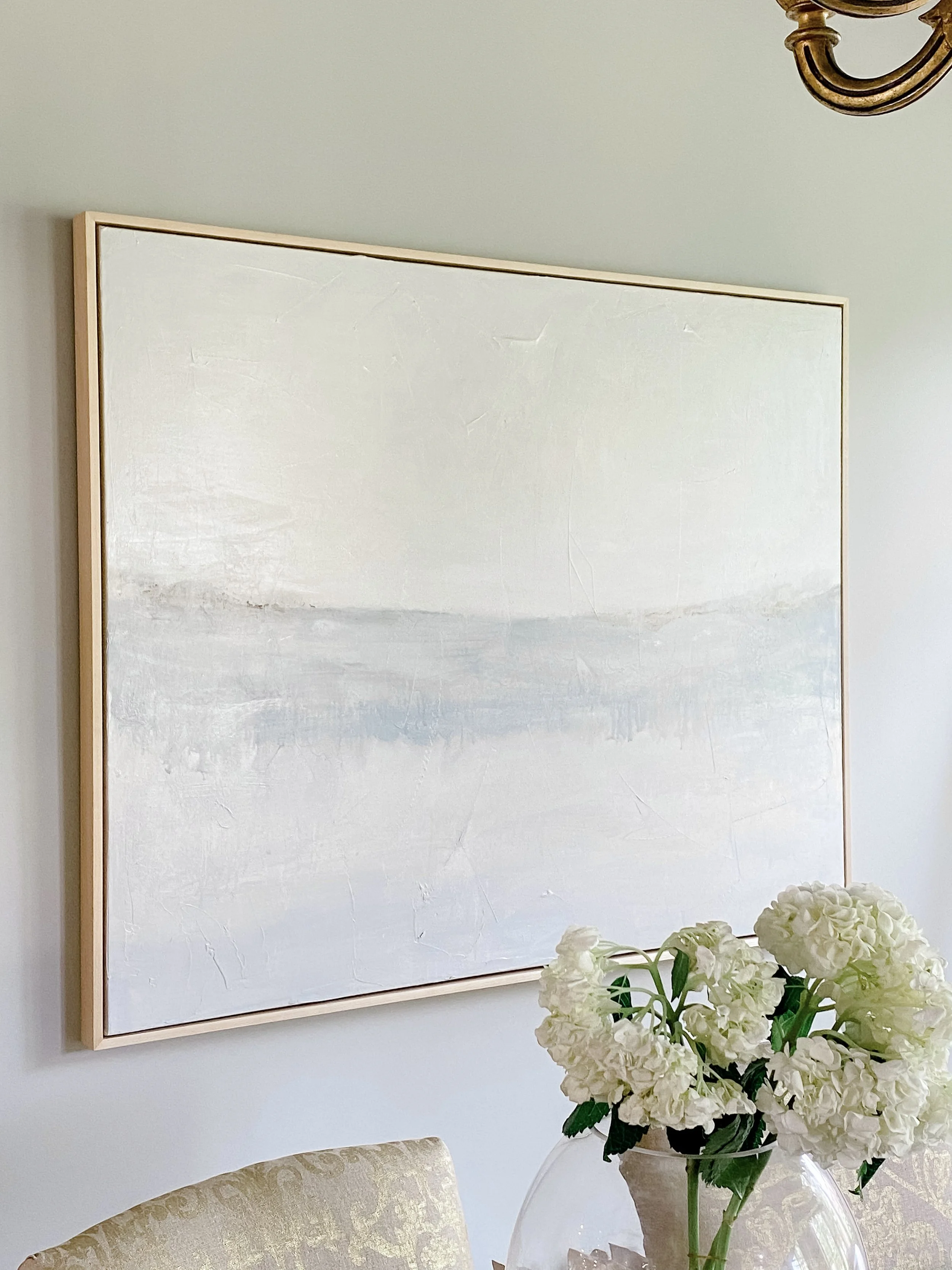 Abstract landscape wall art in muted tones.