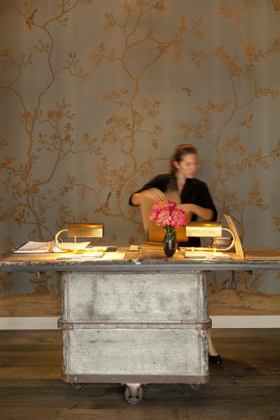 Front desk with handpainted wall.jpg