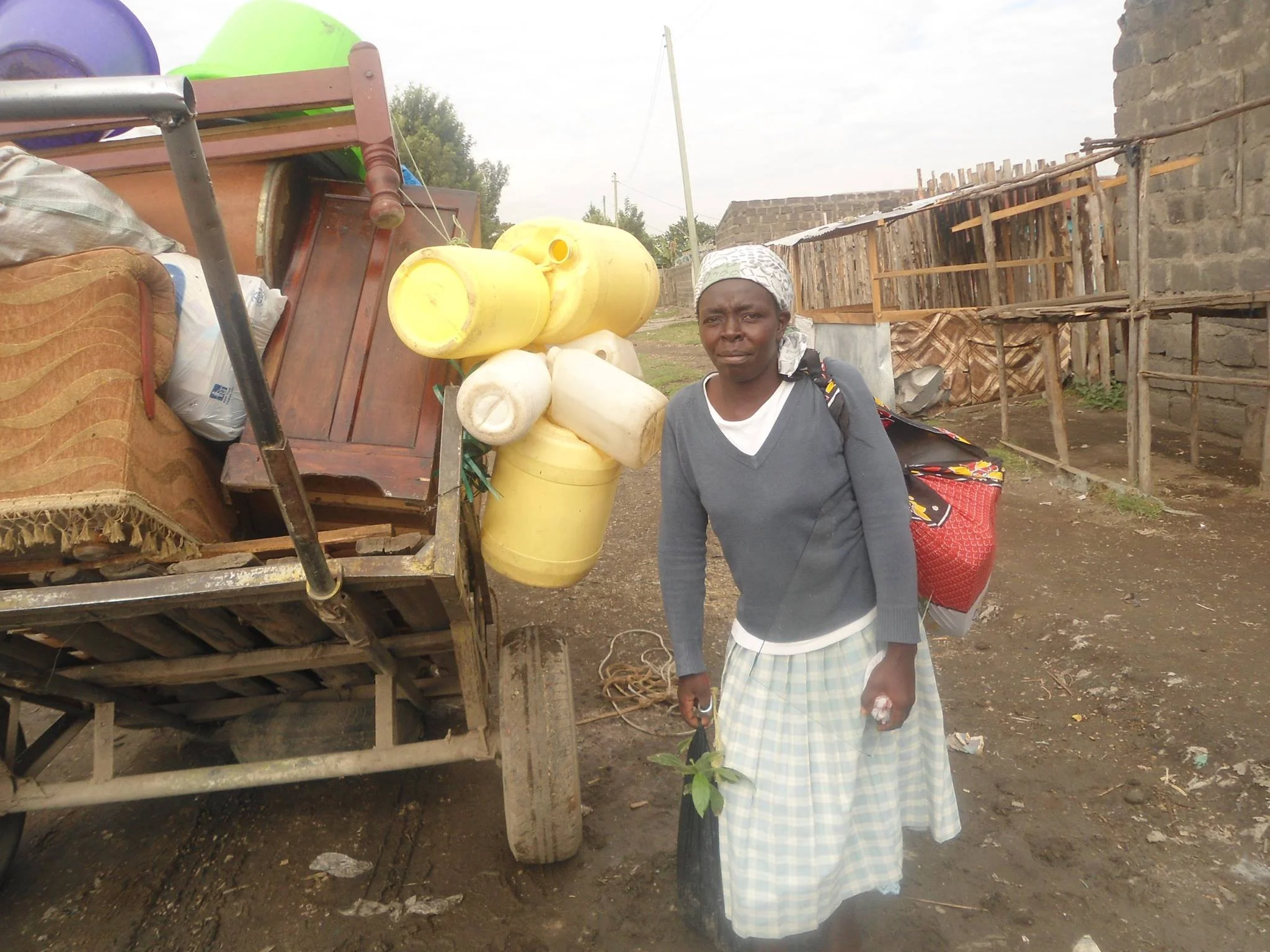Grace Muthoni, one of the Shikamoo Housing Project beneficiary on her way to her new house. Photo Credits: Sammy Njuguna, Nakuru.