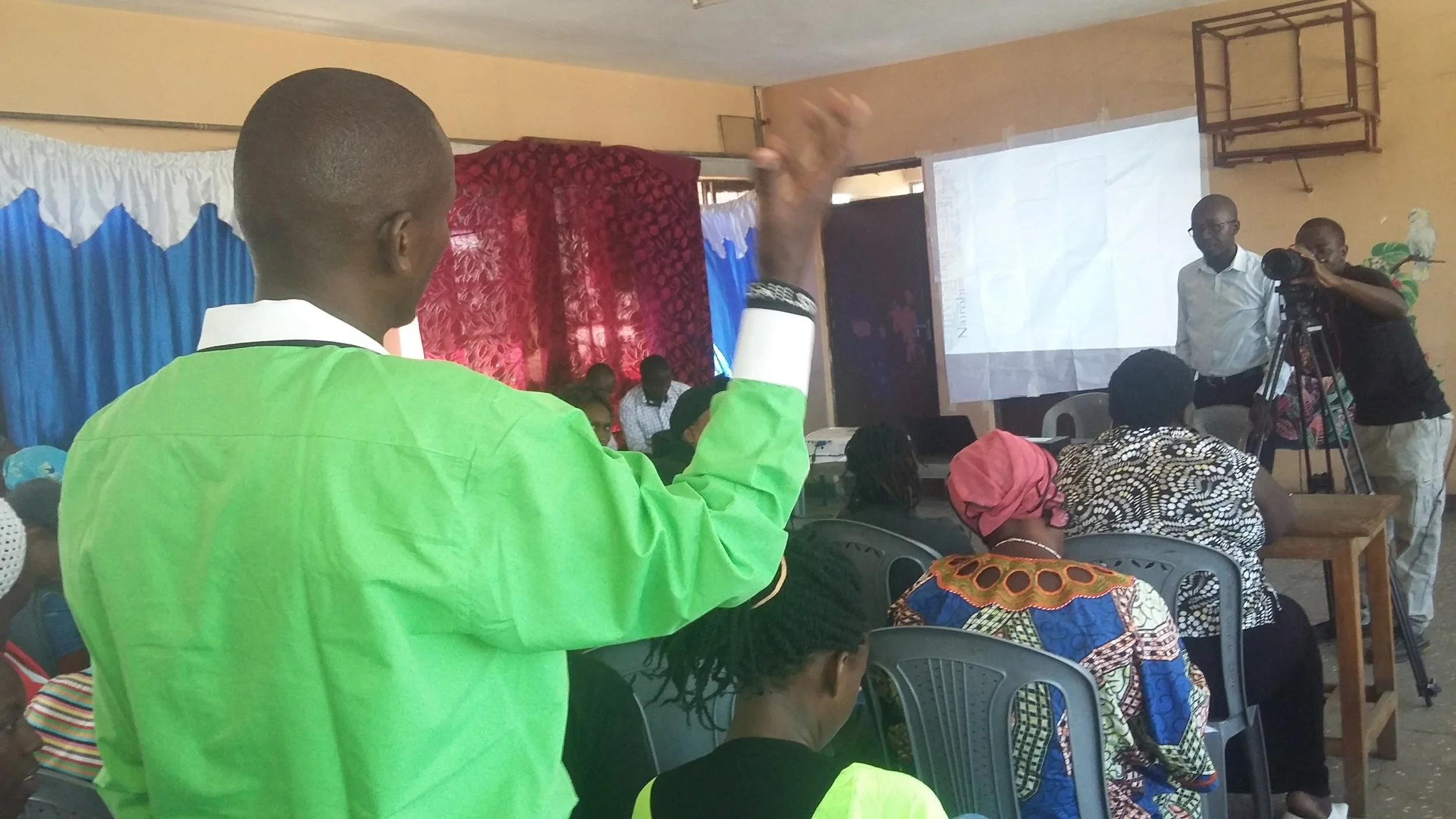 Willy Maina, one of the food security and safety coordinator makes a point during the training