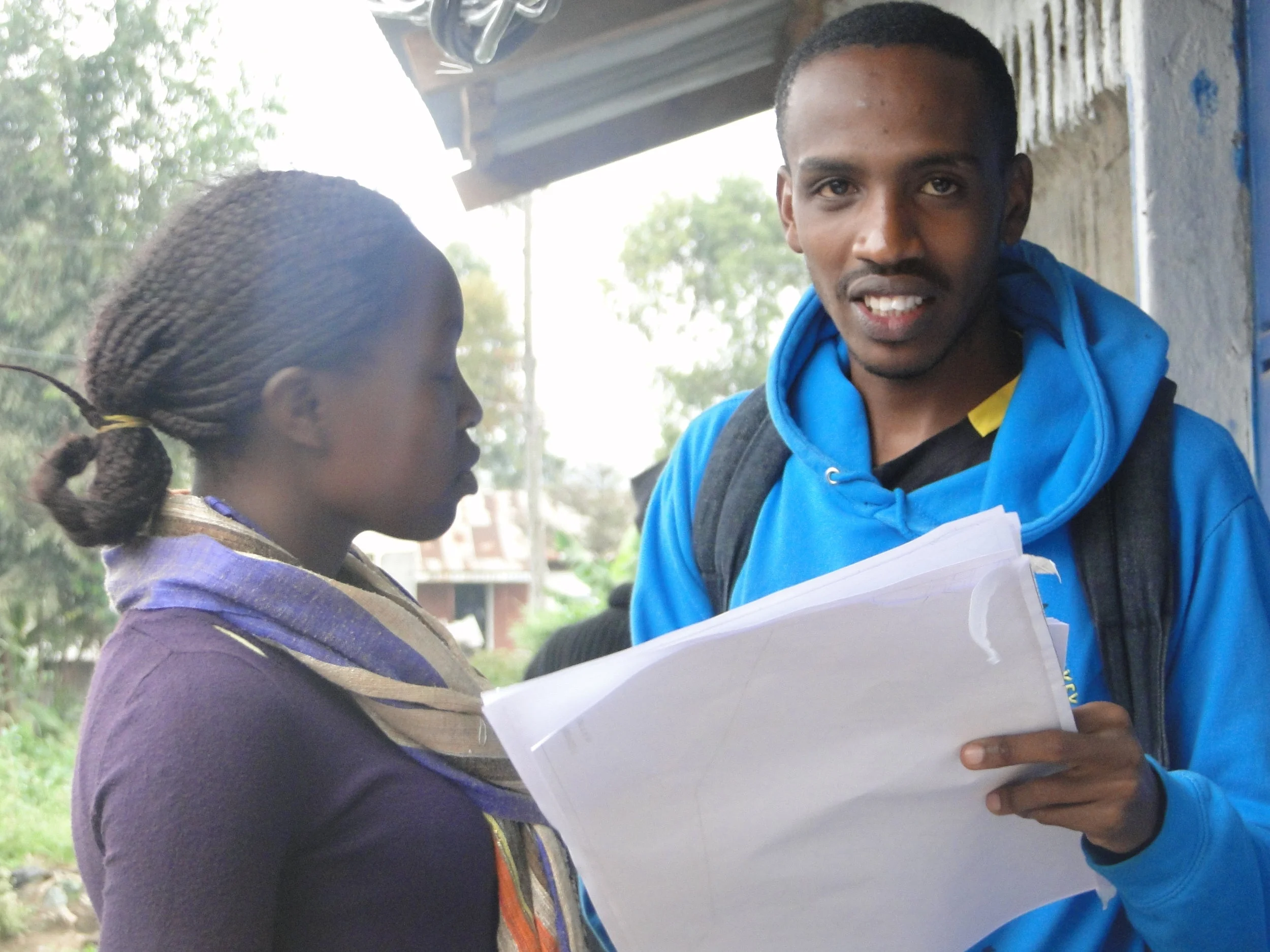 Kelvin supporting a recent settlement profiling in Mukuru Kwa Reuben.