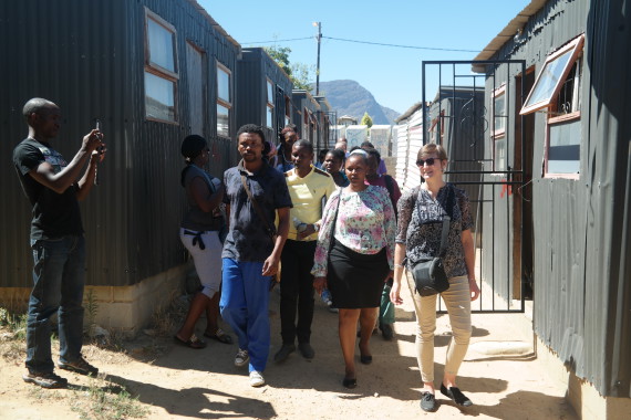 Walking through partially reblocked section of Langrug.