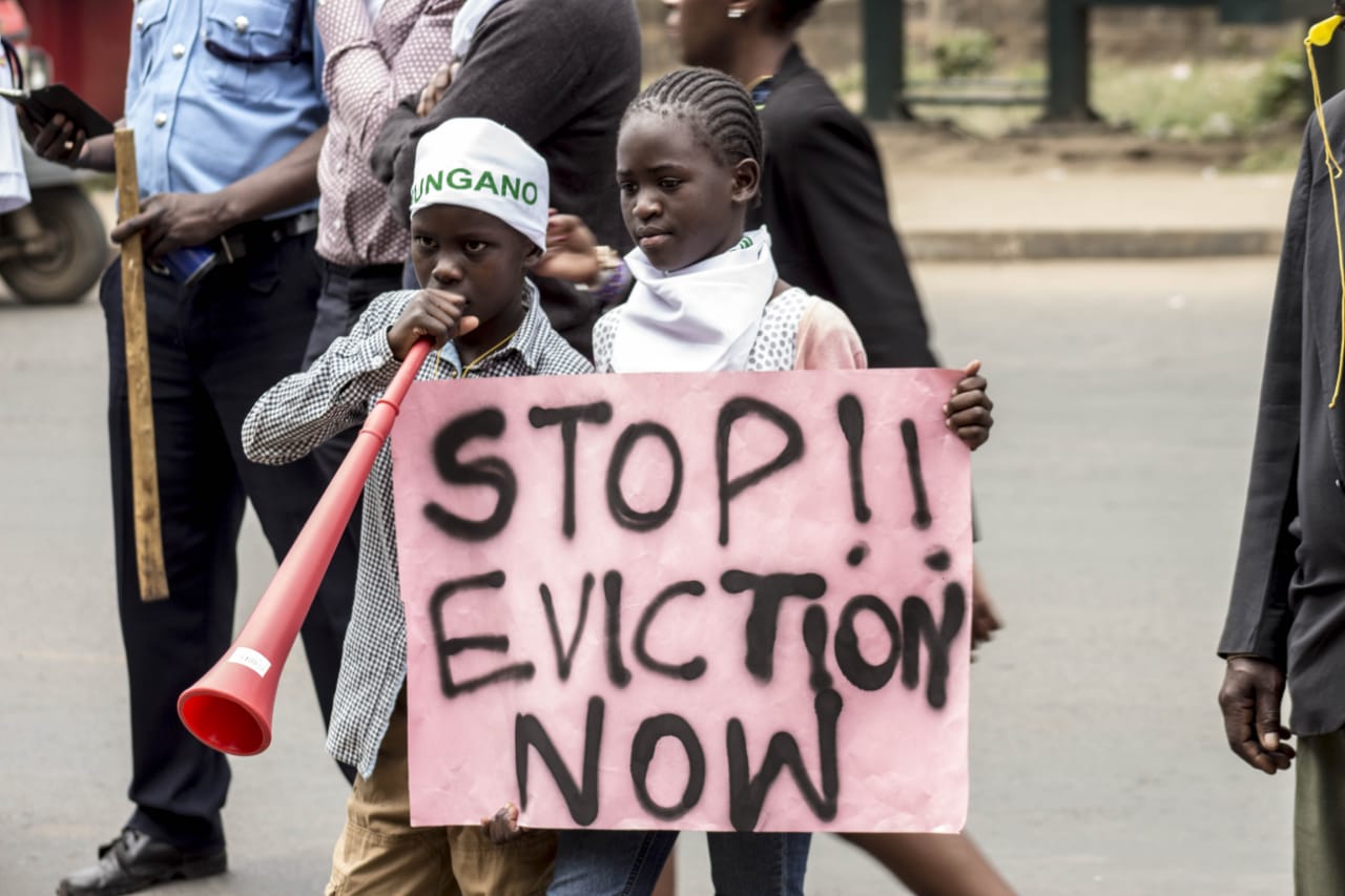 2012 (top) Mukuru evictions protest; and 2018 (bottom) Kibera forced evictions. Over the years Muungano’s relationship with the state has changed towards dialogue—but many of the same old challenges are still there and those old skills of resistance are kept in the federation’s back pocket.