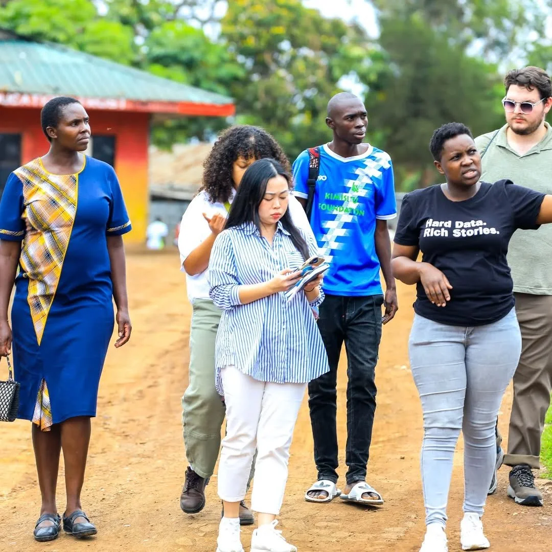 The George Washington University team visited Mathare to explore community-led nature-based solutions (NbS) and gender-responsive heat adaptation initiatives. 

Together with Muungano Federation members, they witnessed how grassroots groups addresses