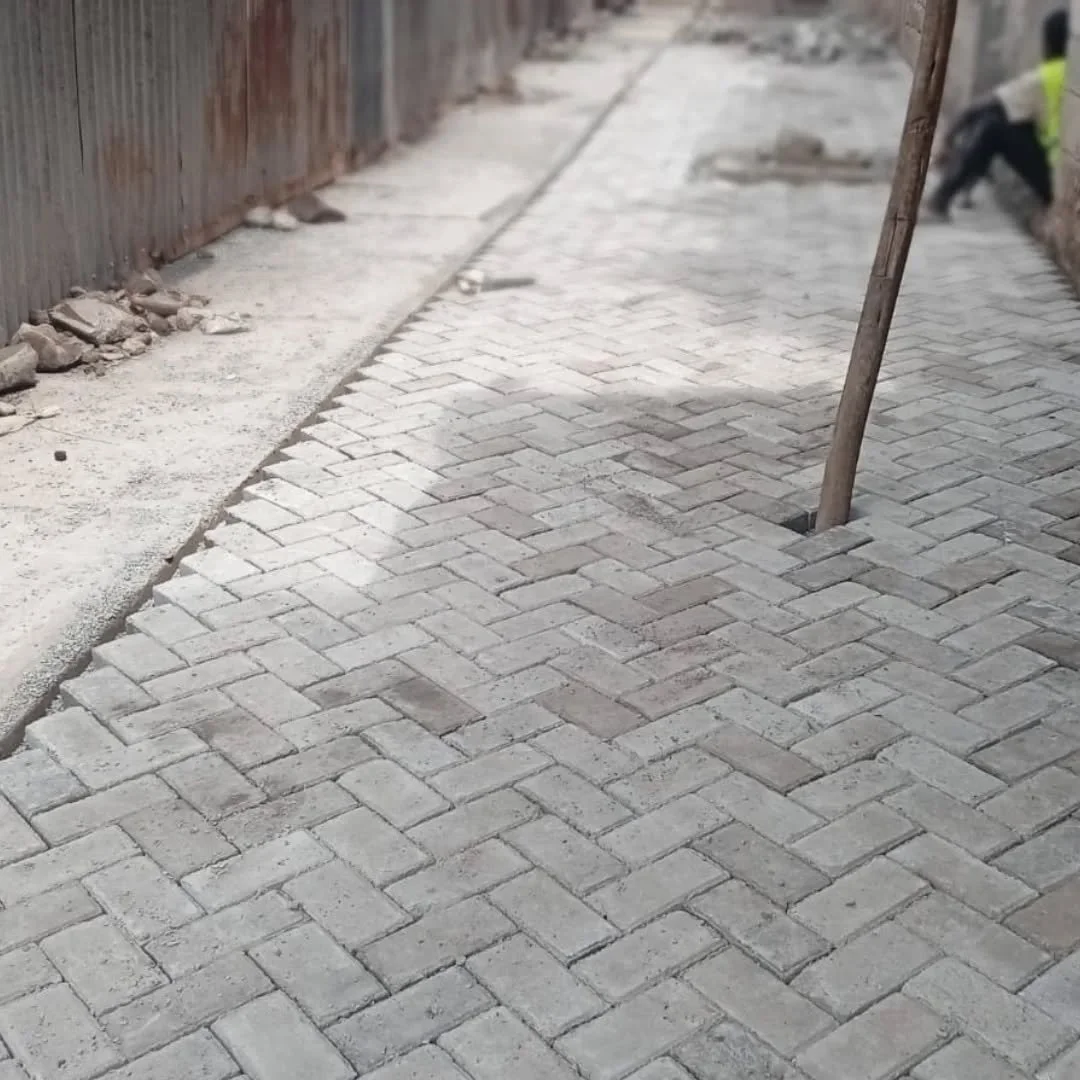 The 1st phase of the construction of the drainage channel in Kiamaiko is complete.

We have reinstated the walkways and demonstrated that it is possible to build infrastructure for safety and dignity with the community.

#MuunganoAt30 #MakingSlumsVis