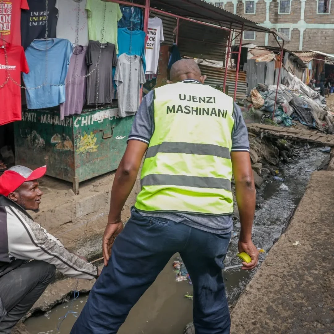 Day 1, Phase 02: Measuring, planning, building: Kiamaiko&rsquo;s new drainage channel starts here.
 
Ground was marked, measurements were set out, and the first works began that will reduce flooding, improve sanitation, and restore dignity to homes a