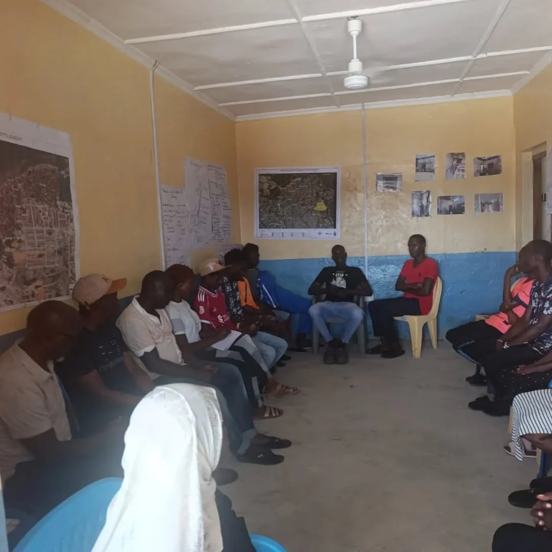 SDI Kenya's Executive Director, Joseph Kimani, and the Muungano wa Wanavijiji National Chairman, Rashid Mutua, joined community members in Tudor Muoroto in a community meeting to understand the progress the community has made in organizing through th