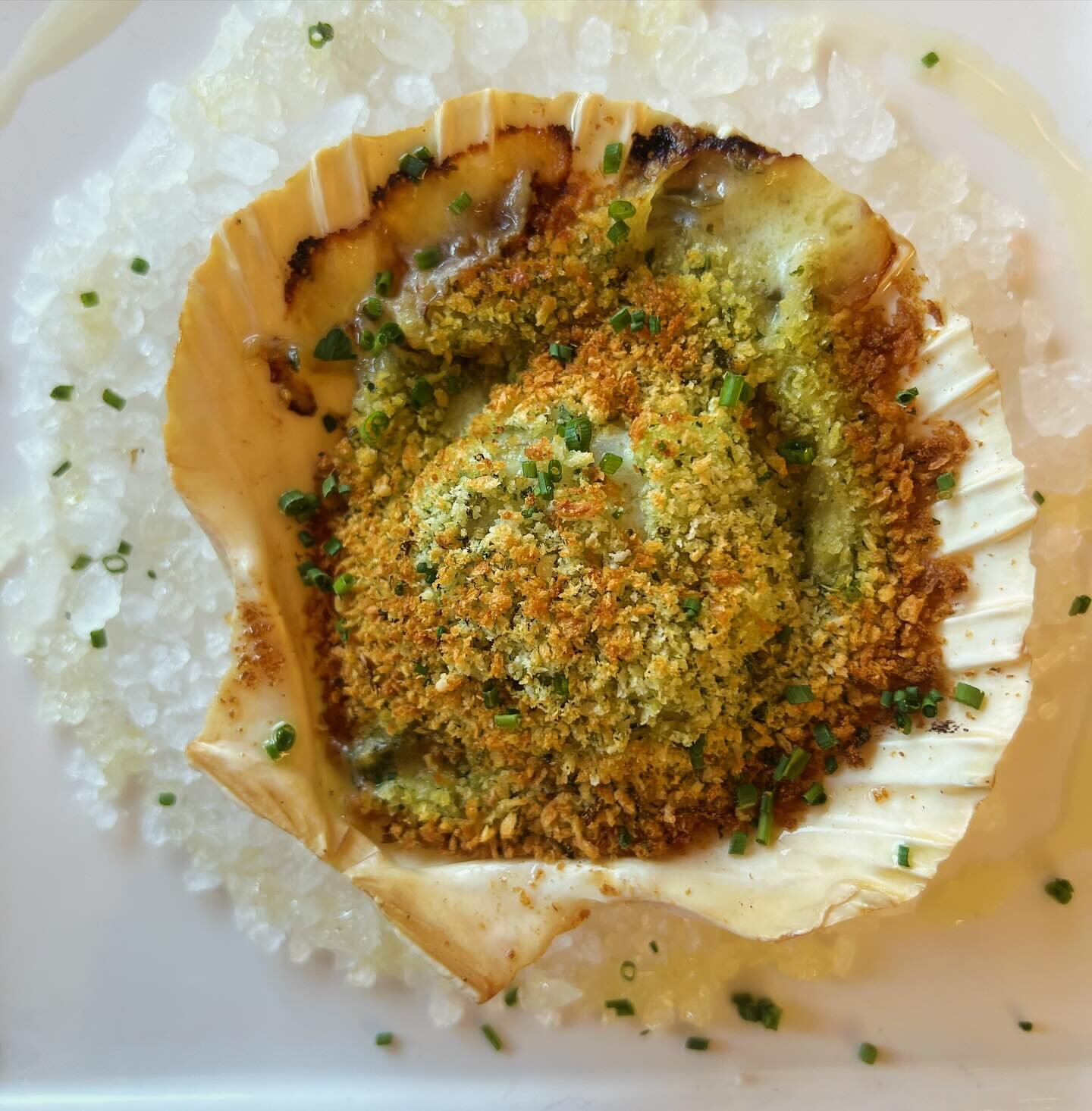 This is the Hokkaido Scallop Rockefeller that is currently on our Happy Hour menu. The deliciously rich scallop is ordered individually, enjoy as many as you&rsquo;d like!