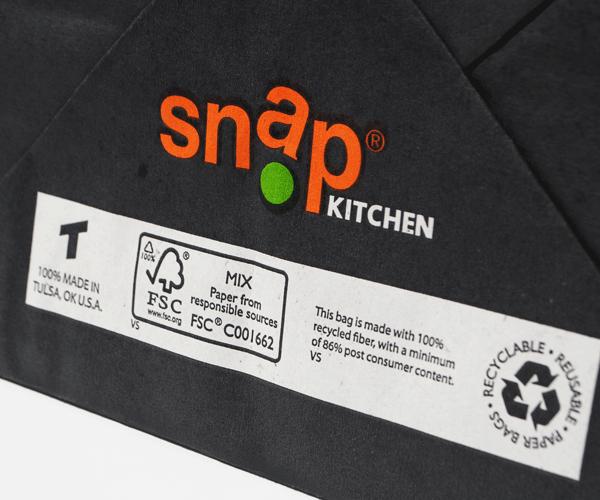 Snap Kitchen Carry-Out Bag Bottom, "This bag is made with 100% recycled fiber, with a minimum of 86% post consumer content."