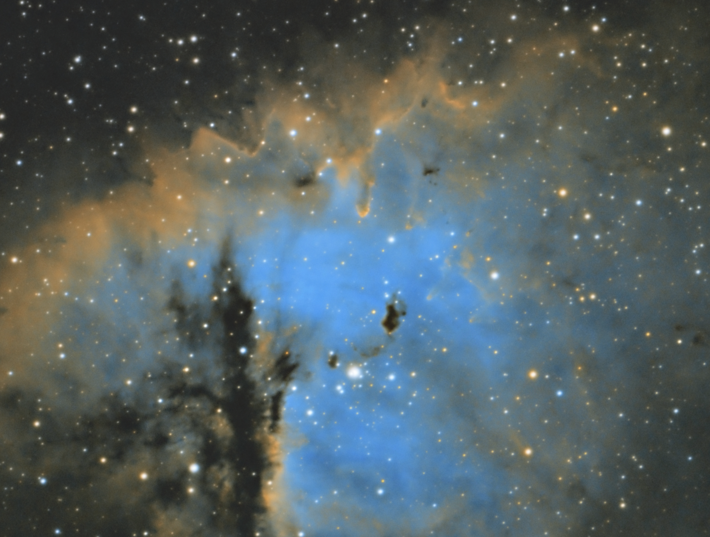 This tight crop of the inner part of the new image really shows off some detail that was missing in my original process of this nebula.