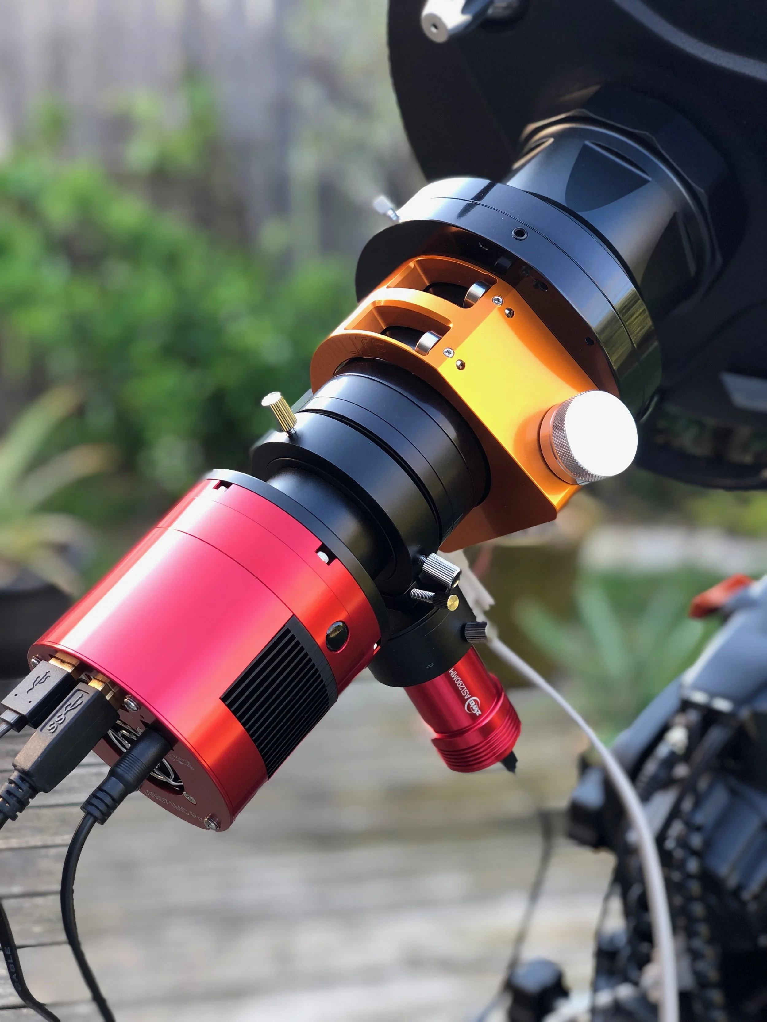 A close up of the imaging train. ZWO ASI174MM-Mini guide scope, with the ZWO Off-Axis Guider, a 2” Astronomic L-2 UV/IR block filter, Moonlite CHL large format Edge focuser, and the ZWO ASI071MC-Pro main camera.