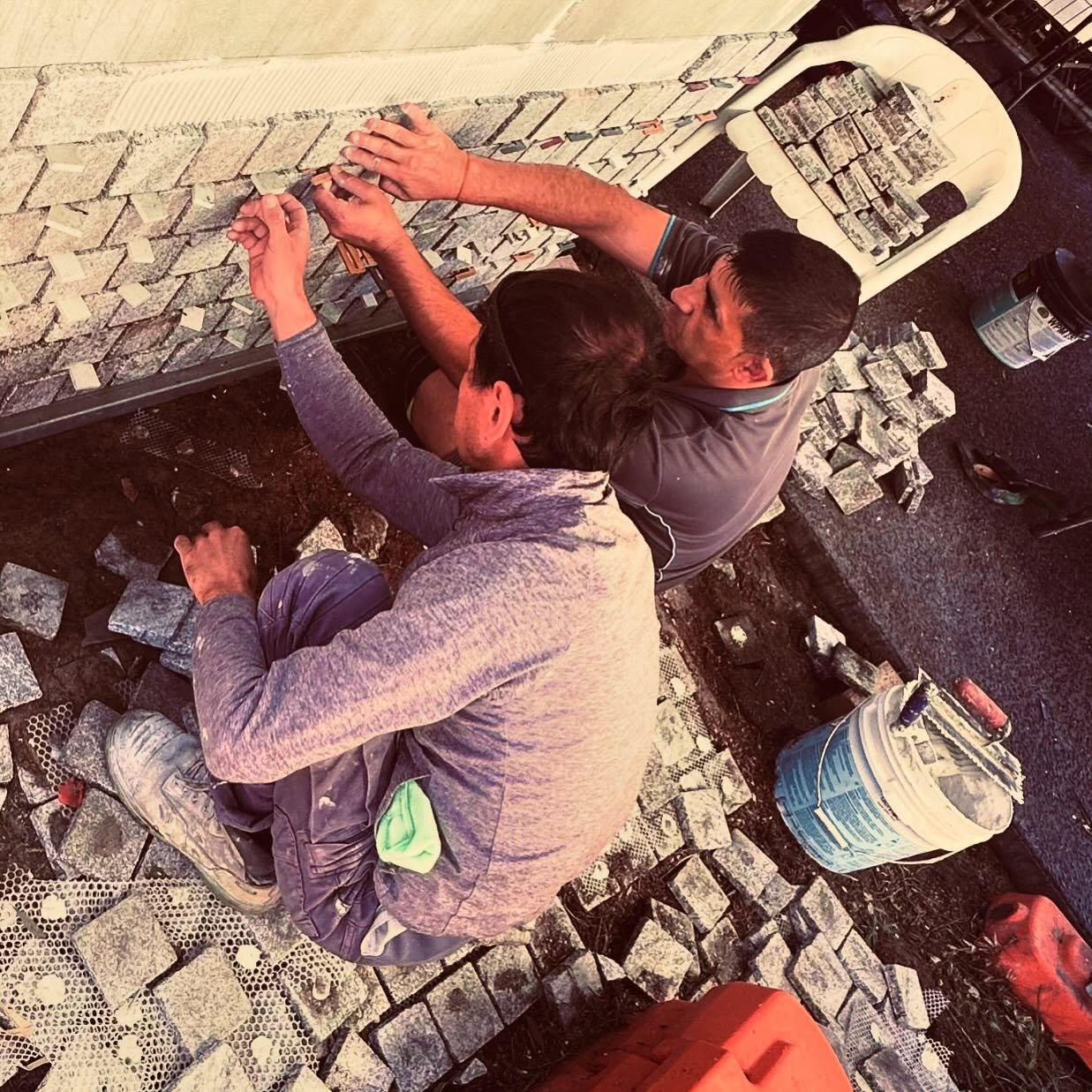 Martin and Taz: Genius Crafters of stone and tile. The best team I have ever had the honor of working with. Finishing the last elements of my house; The gate in: The place where any visitor encounters whose house this may be, and adopts the emotional