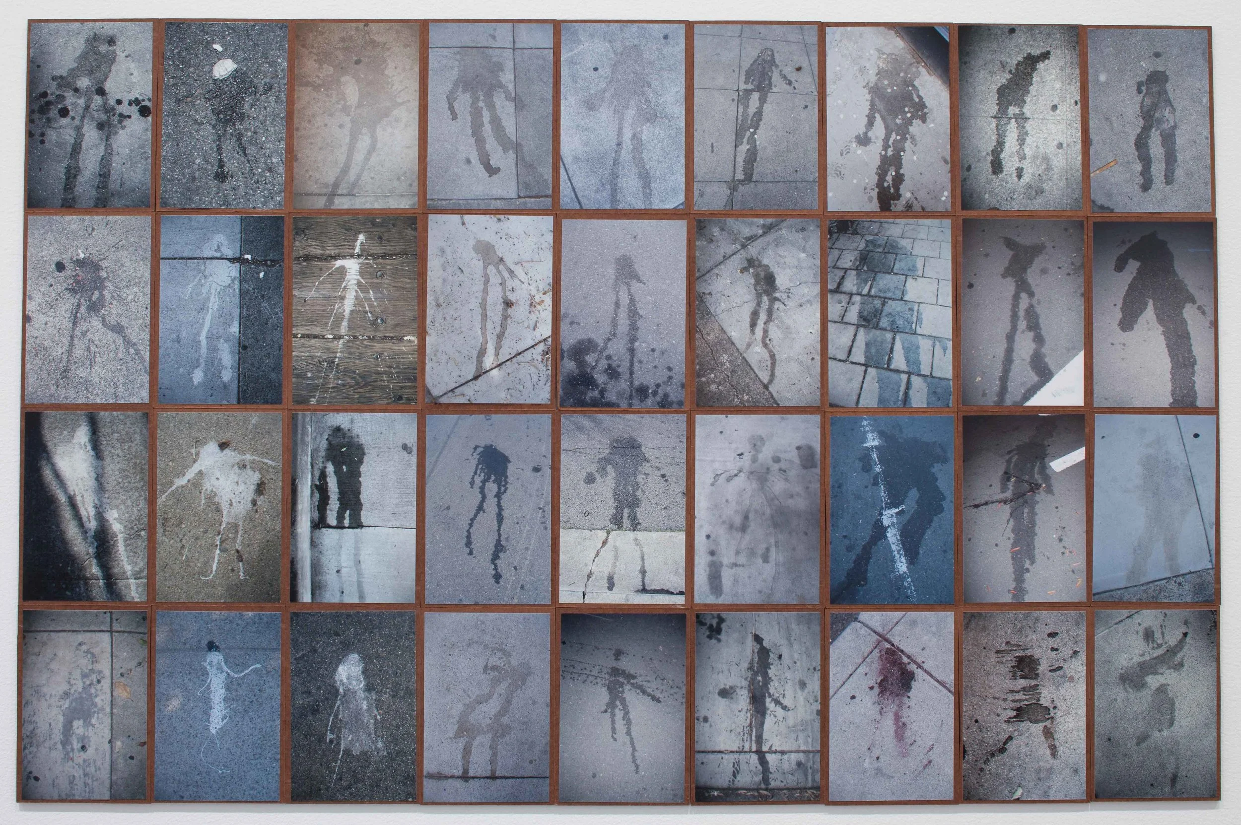 walking stains, 2014, Photographs mounted on wood panels