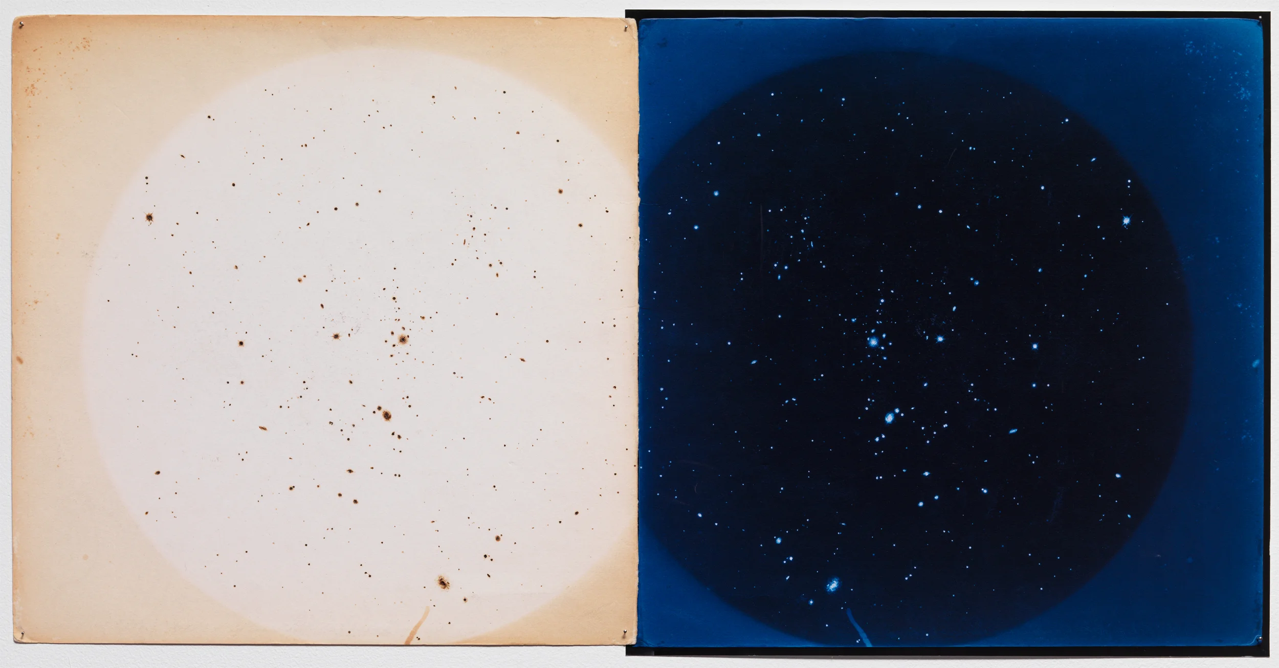 Peace an accidental breathing space (Coma), 2013, Magnifying glass, the sun, record sleeve and giclee negative print 12 7/10 × 24 7/10 in
