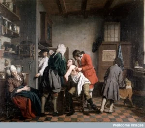 Interior with a surgeon attending to a wound in a man's side
