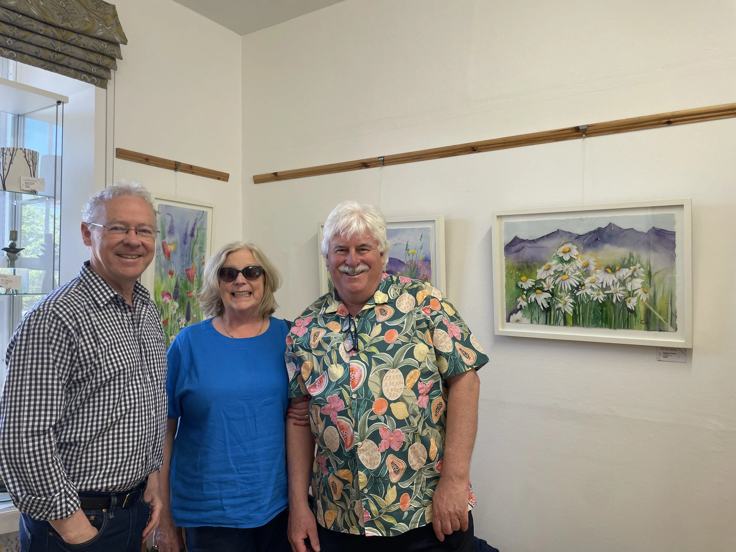 Three very special people in front of "Highland Daisies" in the Alchemist Gallery!