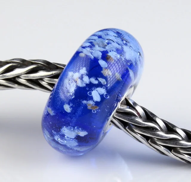 Simple blue charm bead suitable to wear on smaller European charm bracelets
