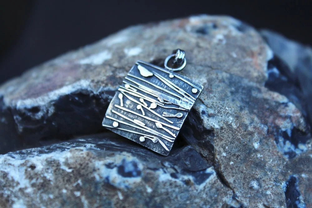 handmade silver shield pendant