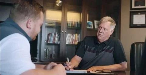 Pat Frazier meeting one-on-one with business leader to discuss Organization Growth Planning