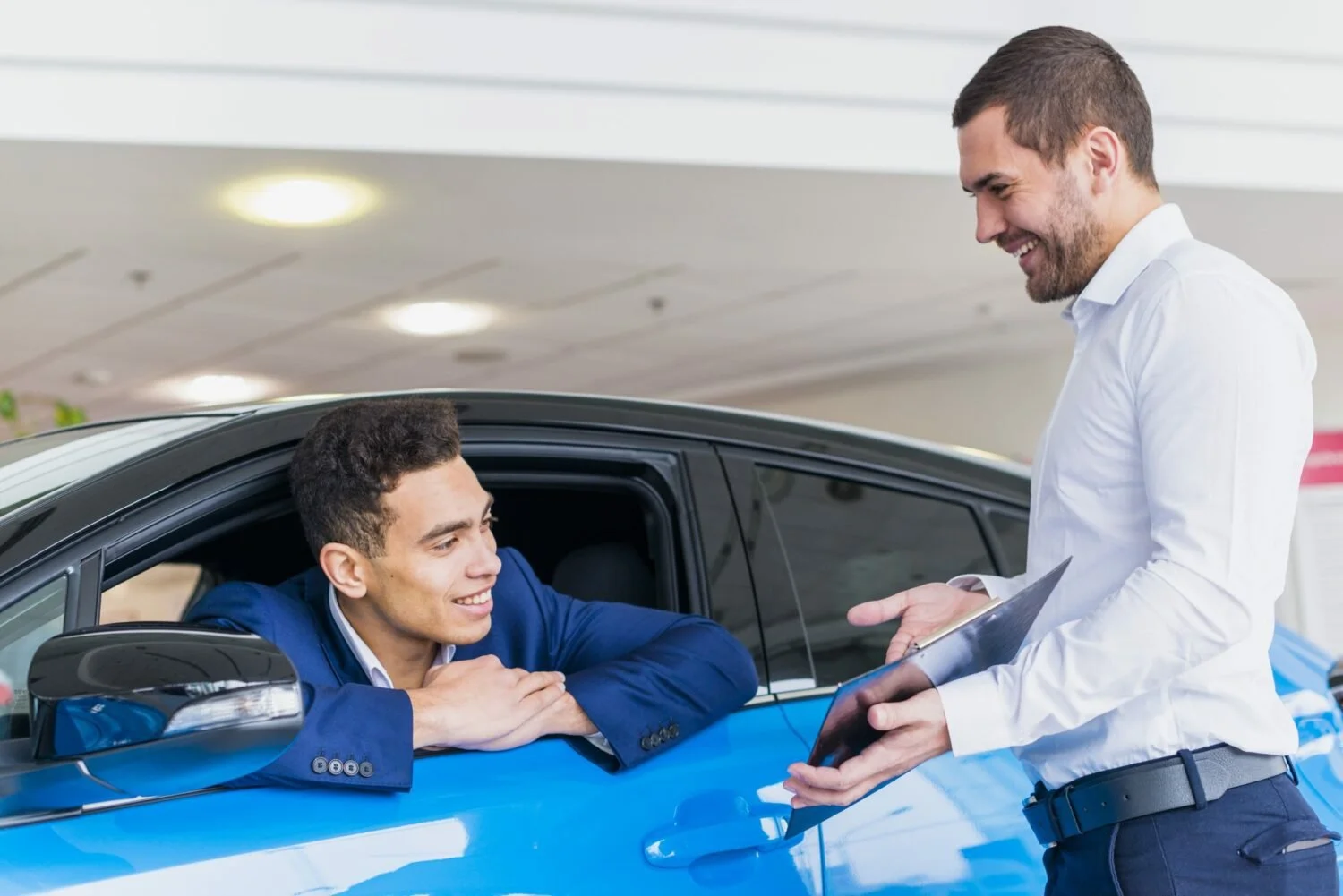 Auto Sales Expert Helping Customer