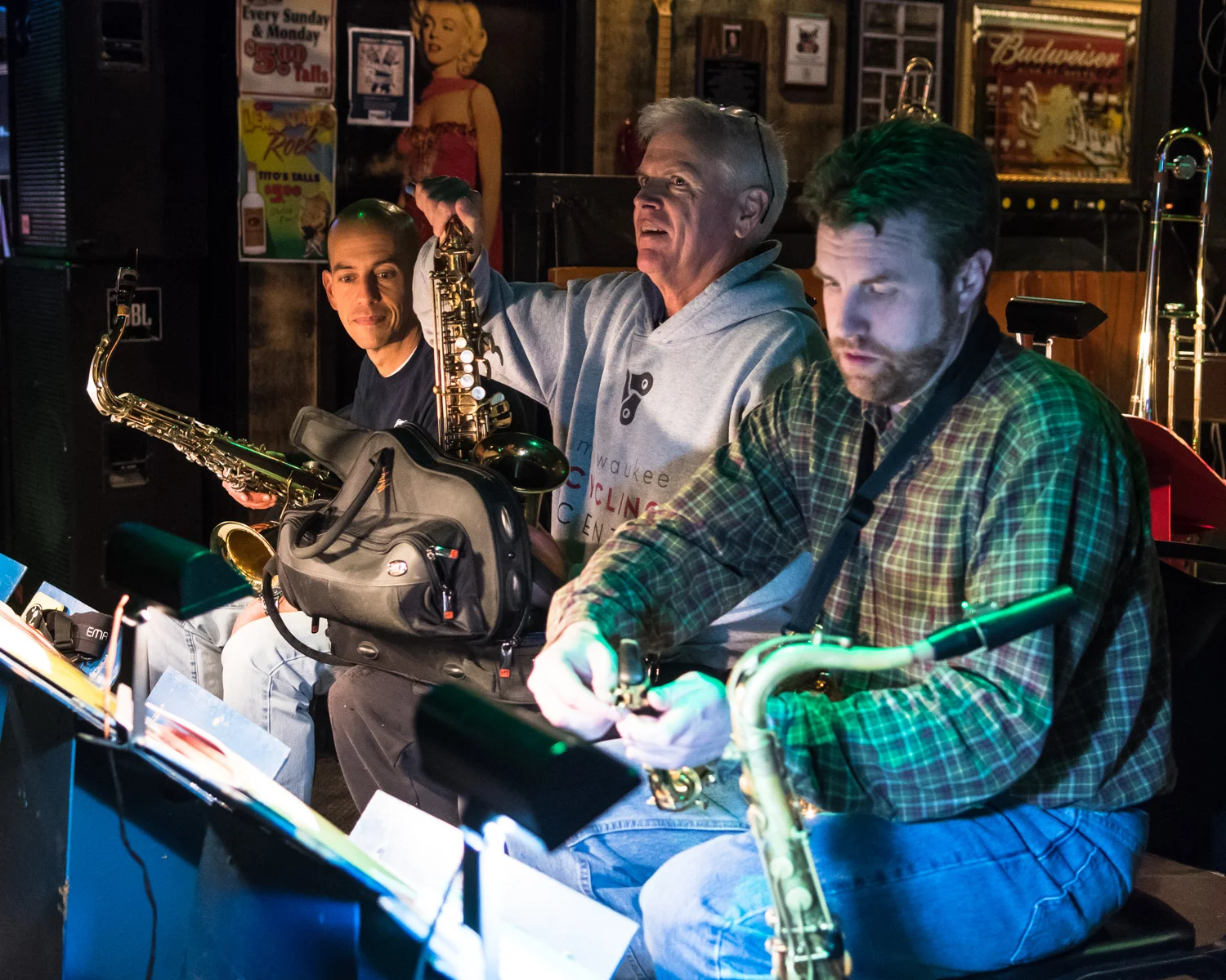 Saxophonists Jordan Gardina, from left, Steve Jacob, and Garrett Kornman of The Parkside Reunion Big Band’s performance Tuesday night. The band performs 8-10 p.m. on the first and third Tuesdays of every month at McAuliffe’s Pub.