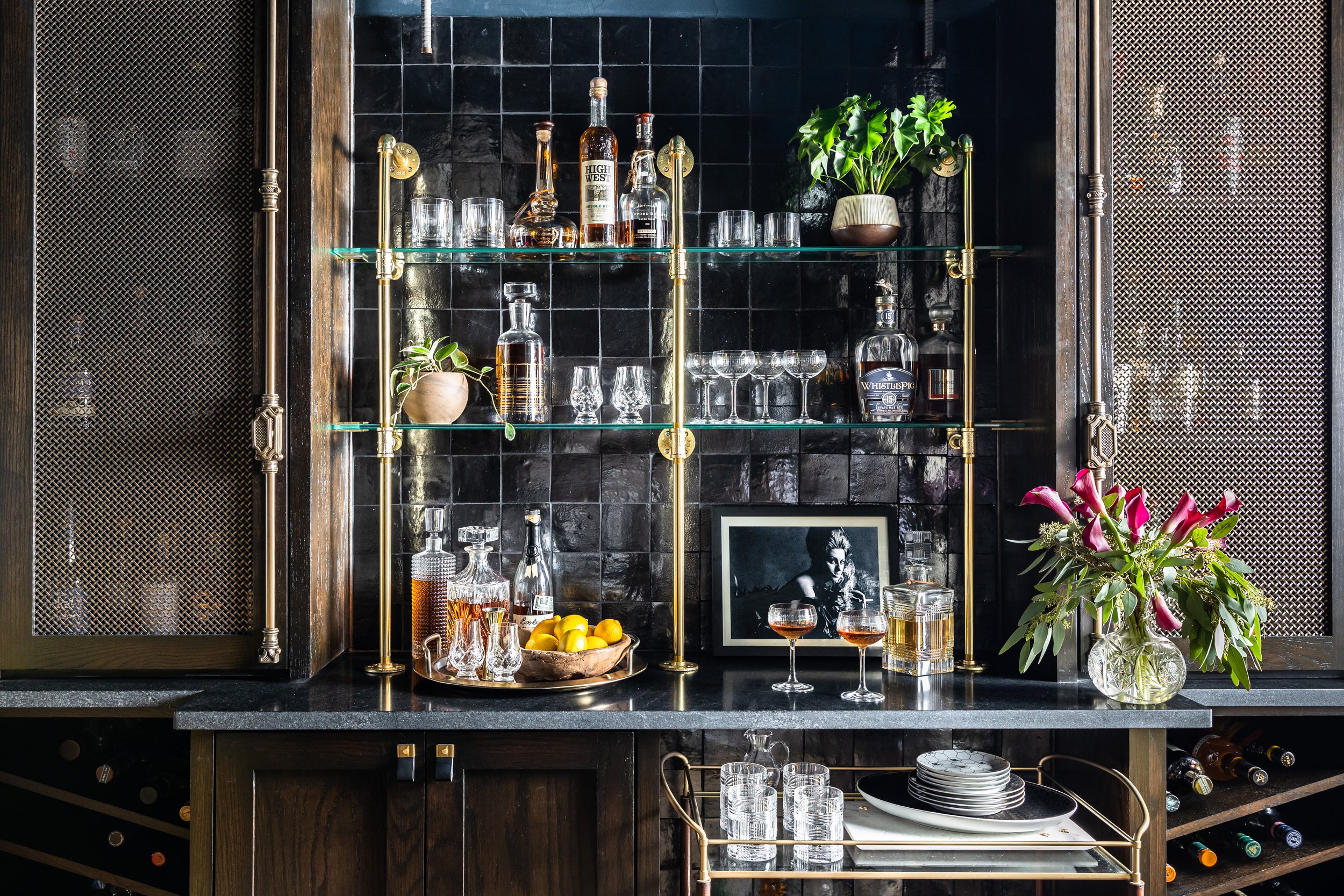 Home bar with black tile