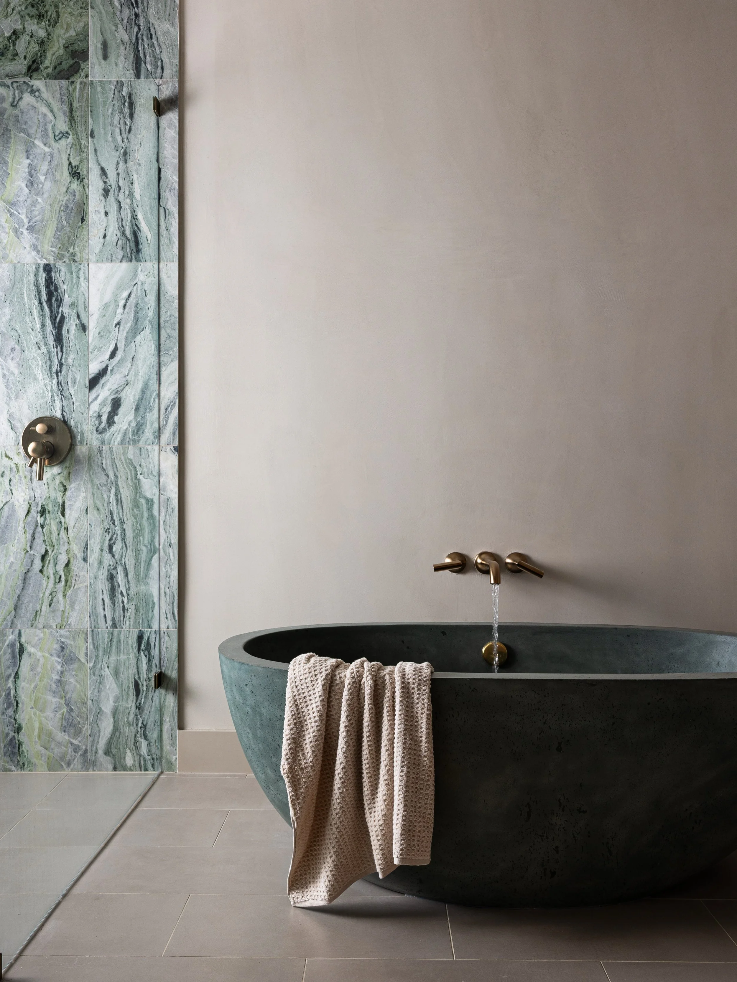 It feels quiet, and I like it. 

Design @neighborinteriors 
Styling @elizabethulrichdesign 
Photo team @sarahlindenphotography @tanner_garza 

#dallasinteriordesign #interiorphotography #bathroominspo #greenmarble #primarybathroom