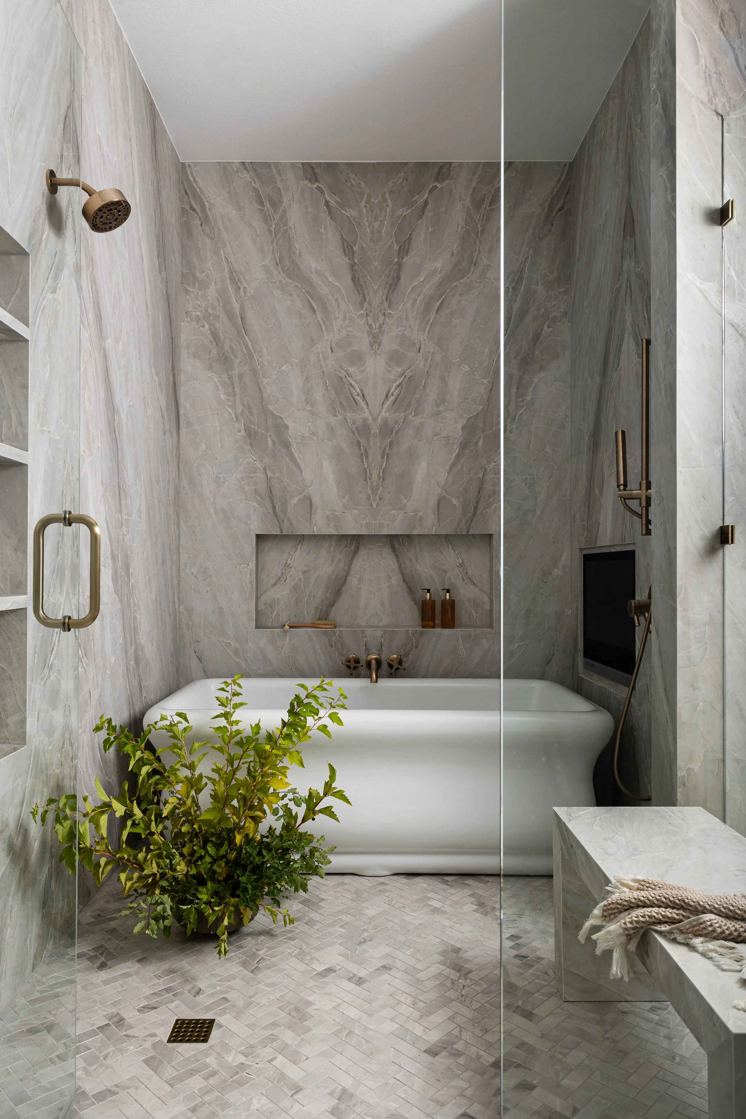 Bookmatched marble bathroom wall, dallas interior photographer