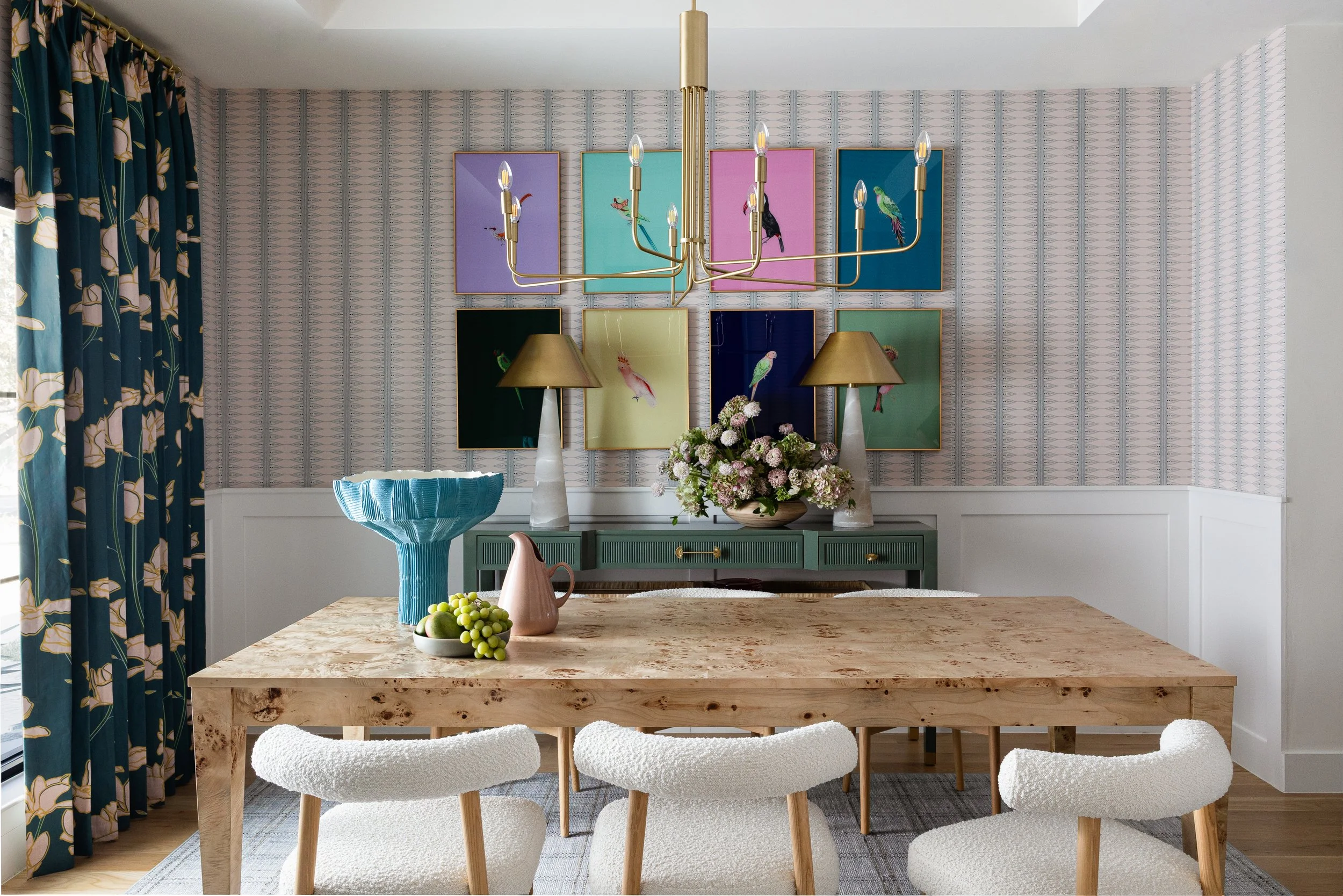 Bird art in jewel toned dining room