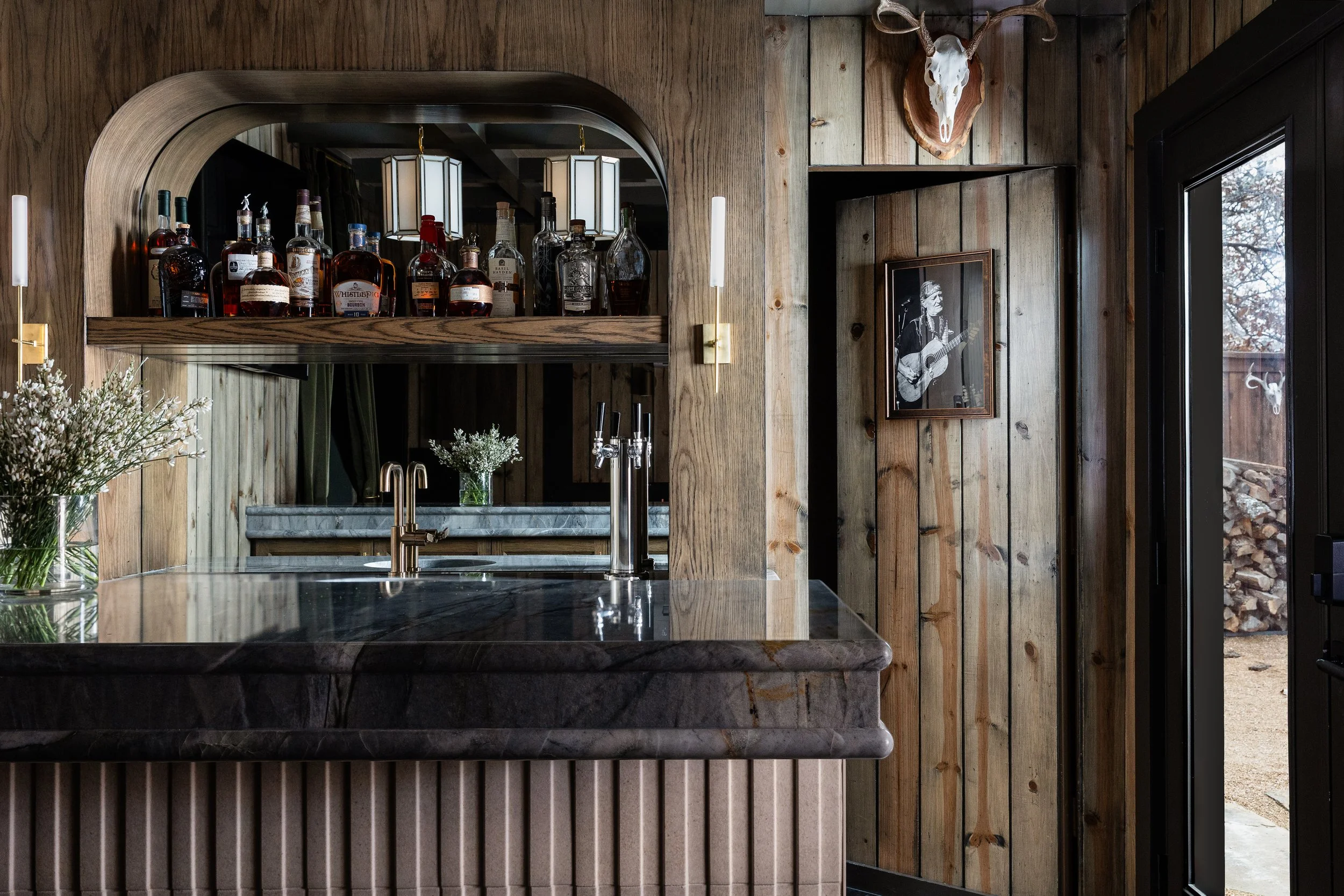Wood paneled bar; interior photographer Sarah Linden