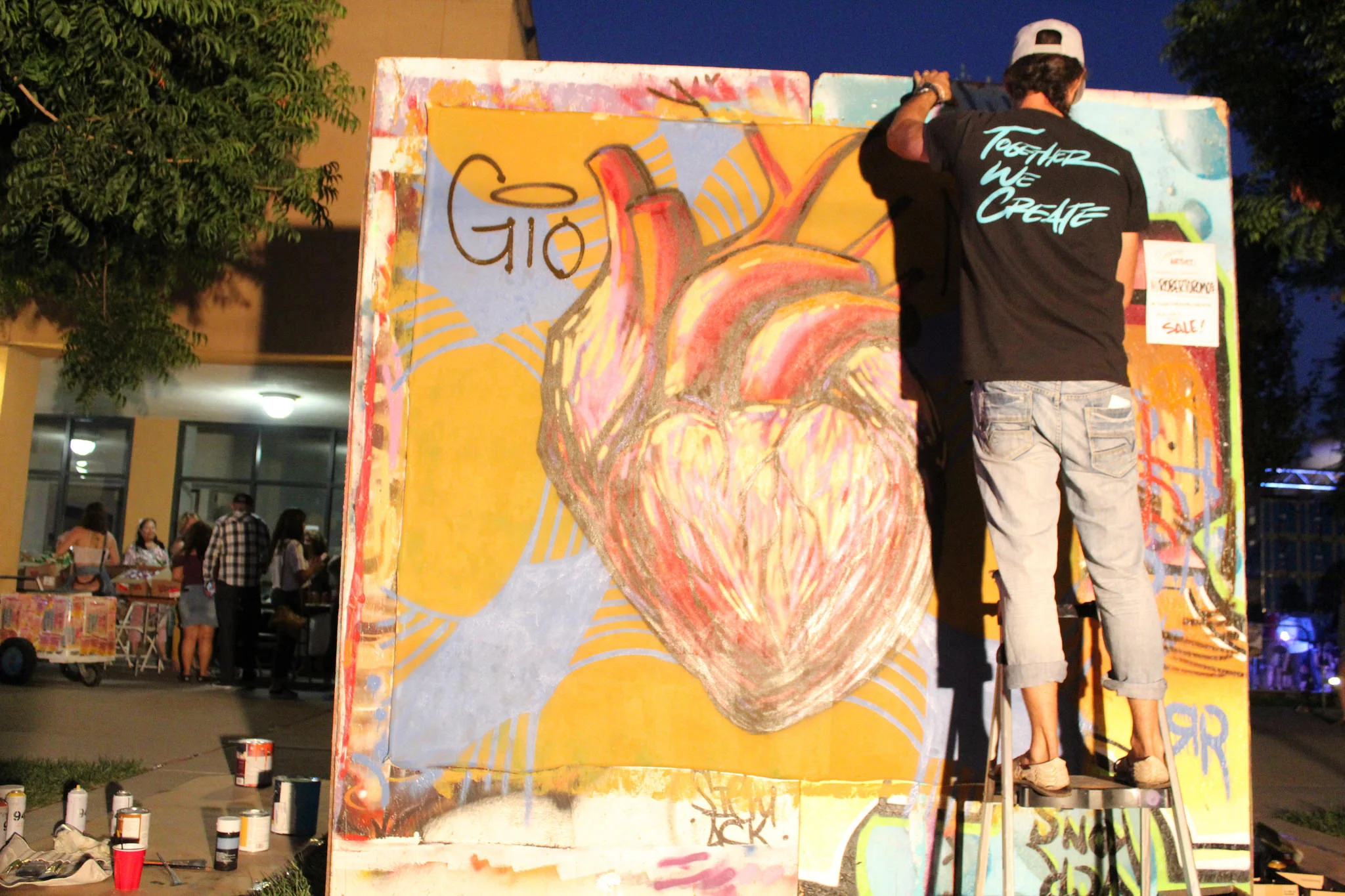 Live painting by Roberto Romo from Together We Create, a collective of educators and artists. Photo by Orlando Espino.