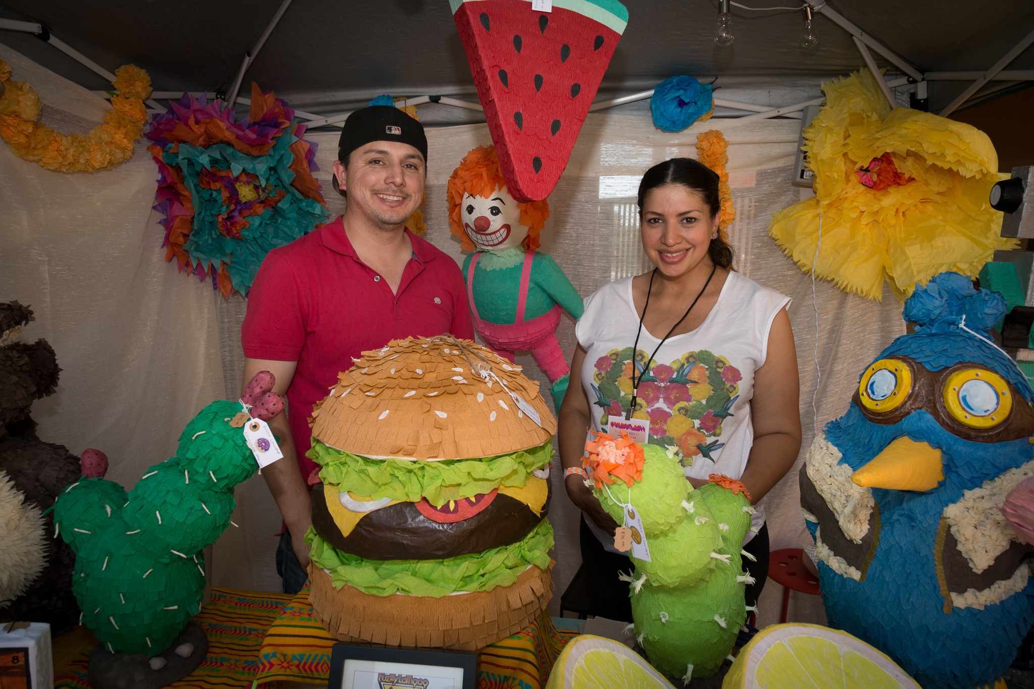 Artisan Patty Botello sells her piñatas as well as leads piñata making workshops for the community to have a hand in the creation of the festival space. Photo by Paolo Riveros.