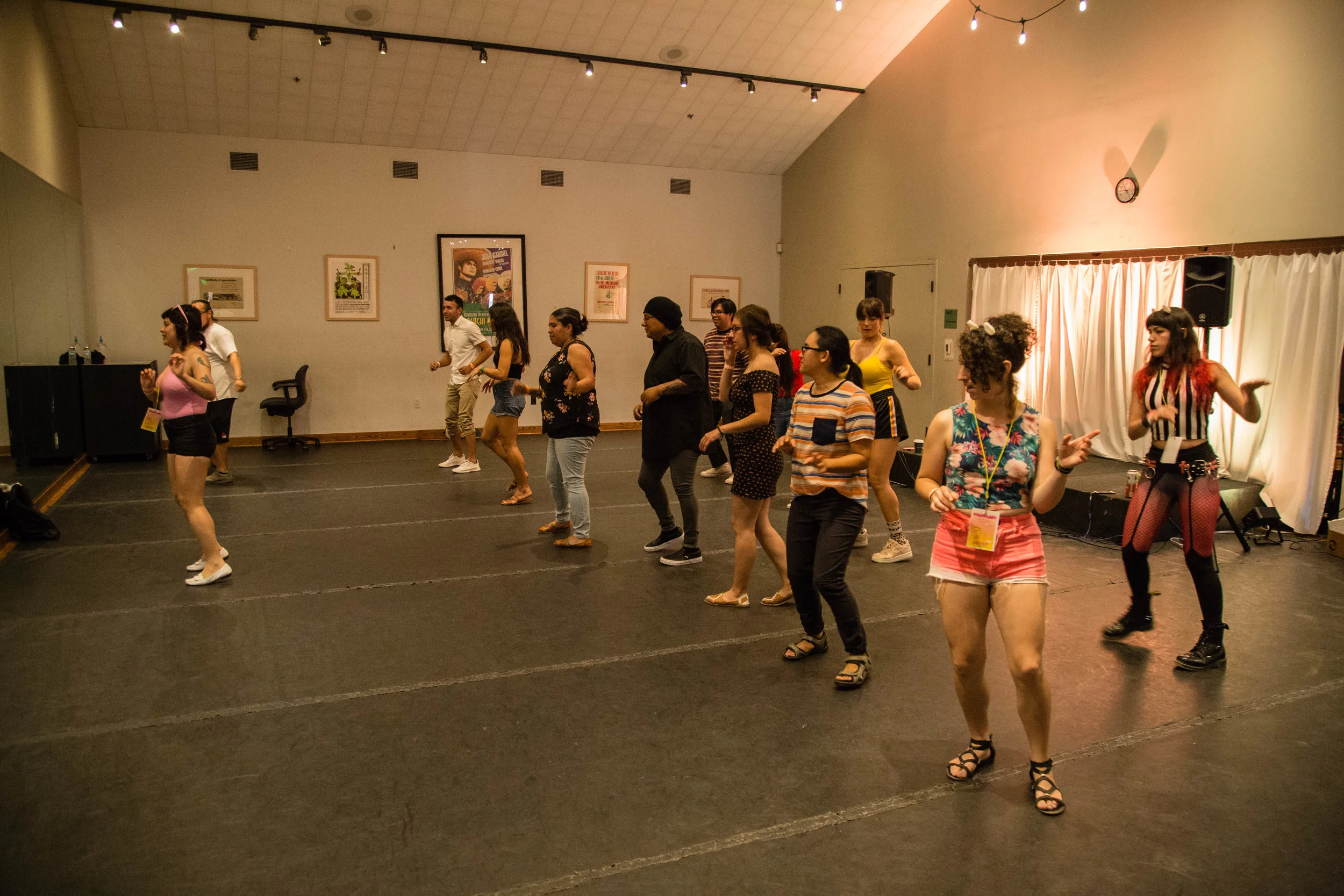 Aranivah, a band member from Ratas, leading cumbia dance workshops for all levels. Photo by Solo Native.