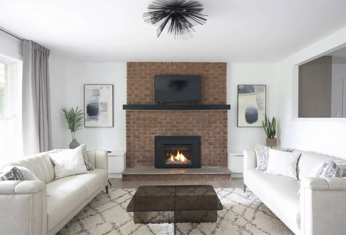 Unlock your brickwork potential. Enhance the original character of an outdated and inoperable fireplace to create a desirable architectural feature in a living room. The wood burning heatilator and four large vents were replaced with masonry and a ne