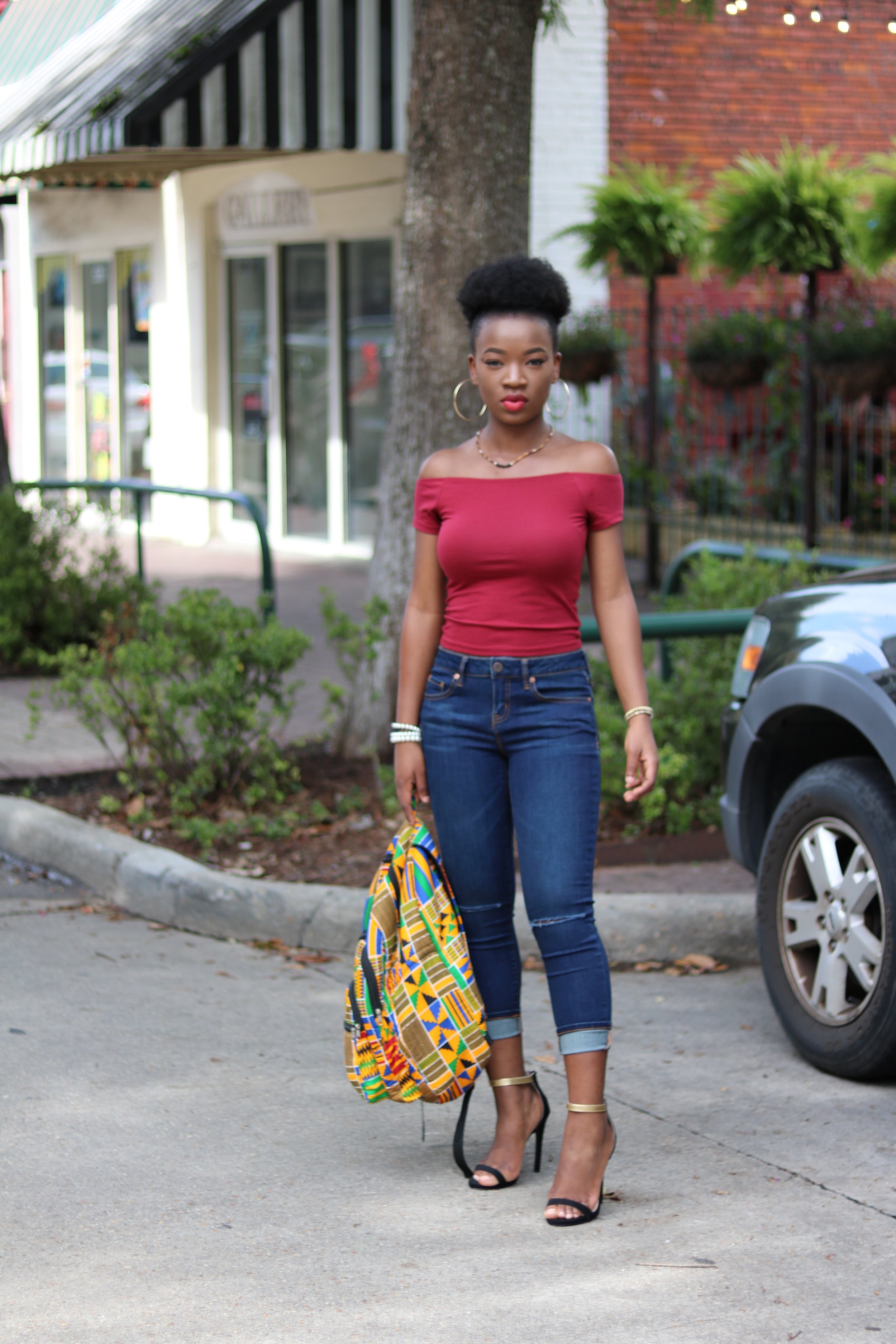 Black girl afro puff distressed jeans