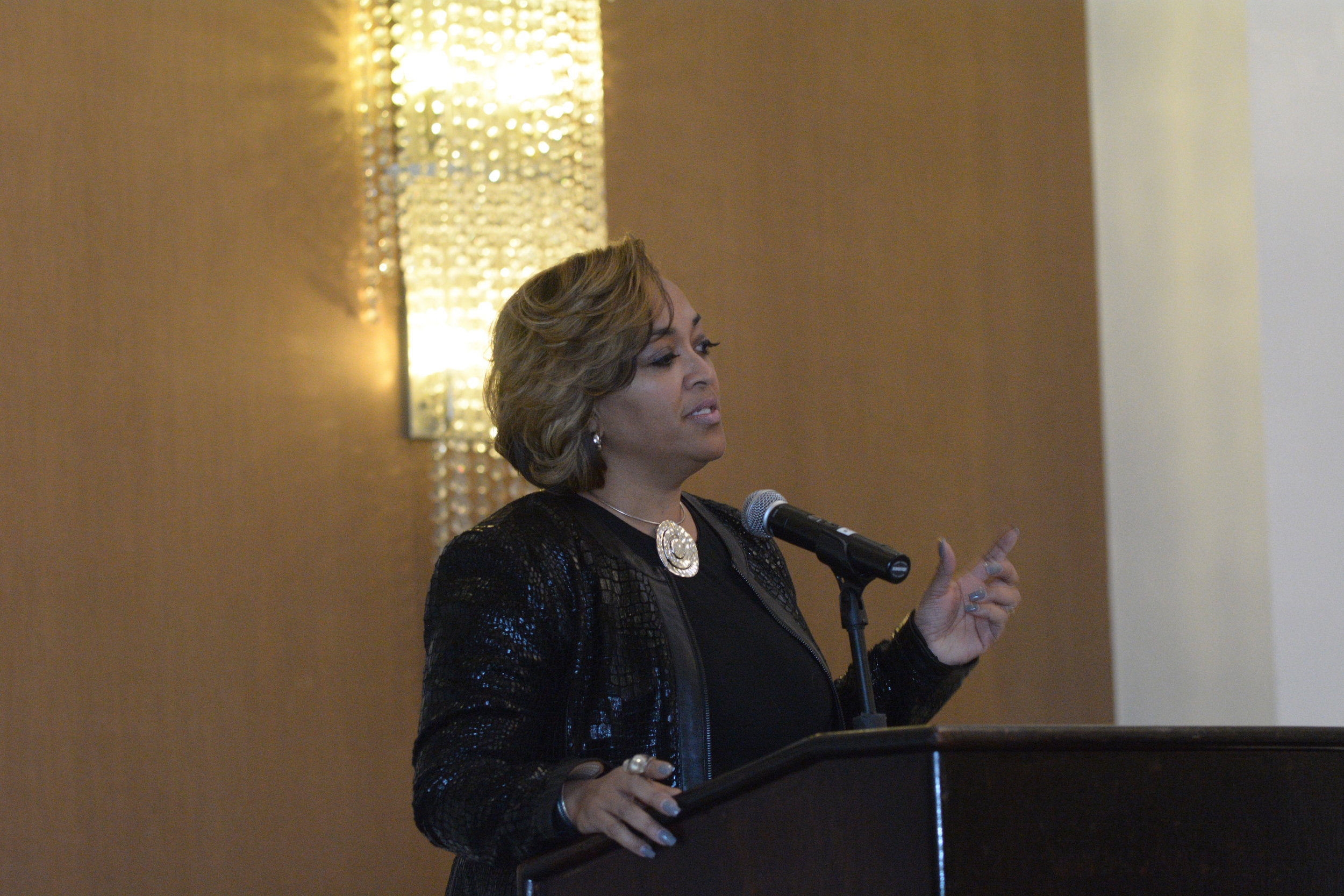Iola Harper gives the welcome address