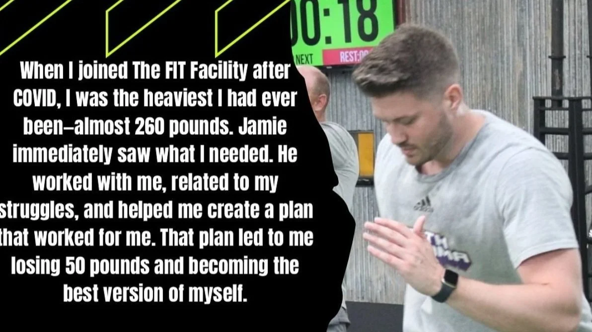 A man praying with his eyes closed and hands together at a gym, with a workout timer visible in the background.