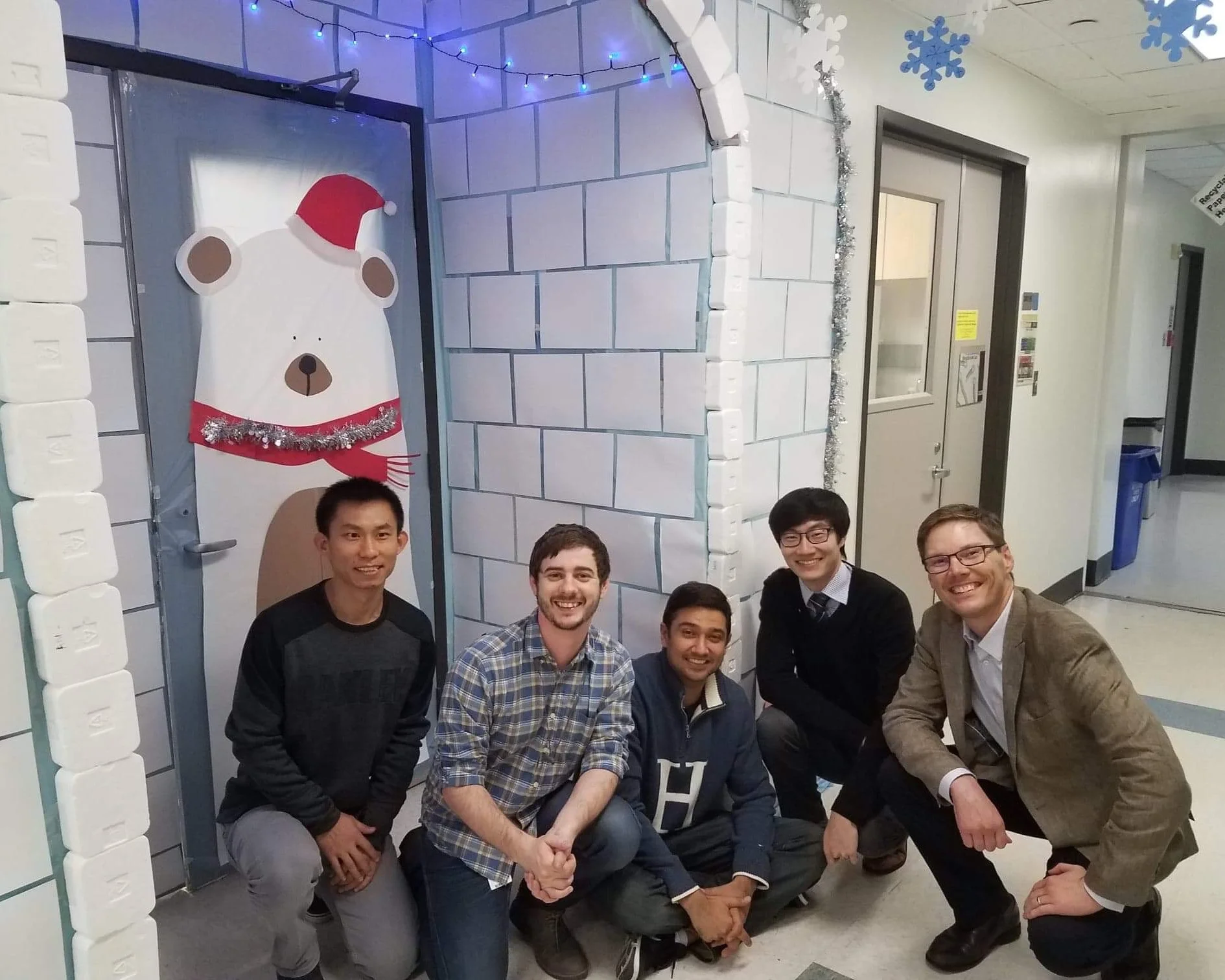 Westbrook lab guys with the 2018 Holiday Door Decorating Contest entry.
