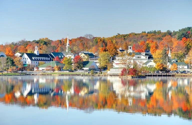 autumn-on-lake-winnipesaukee-royalty-free-image-183774204-1561395316.jpg