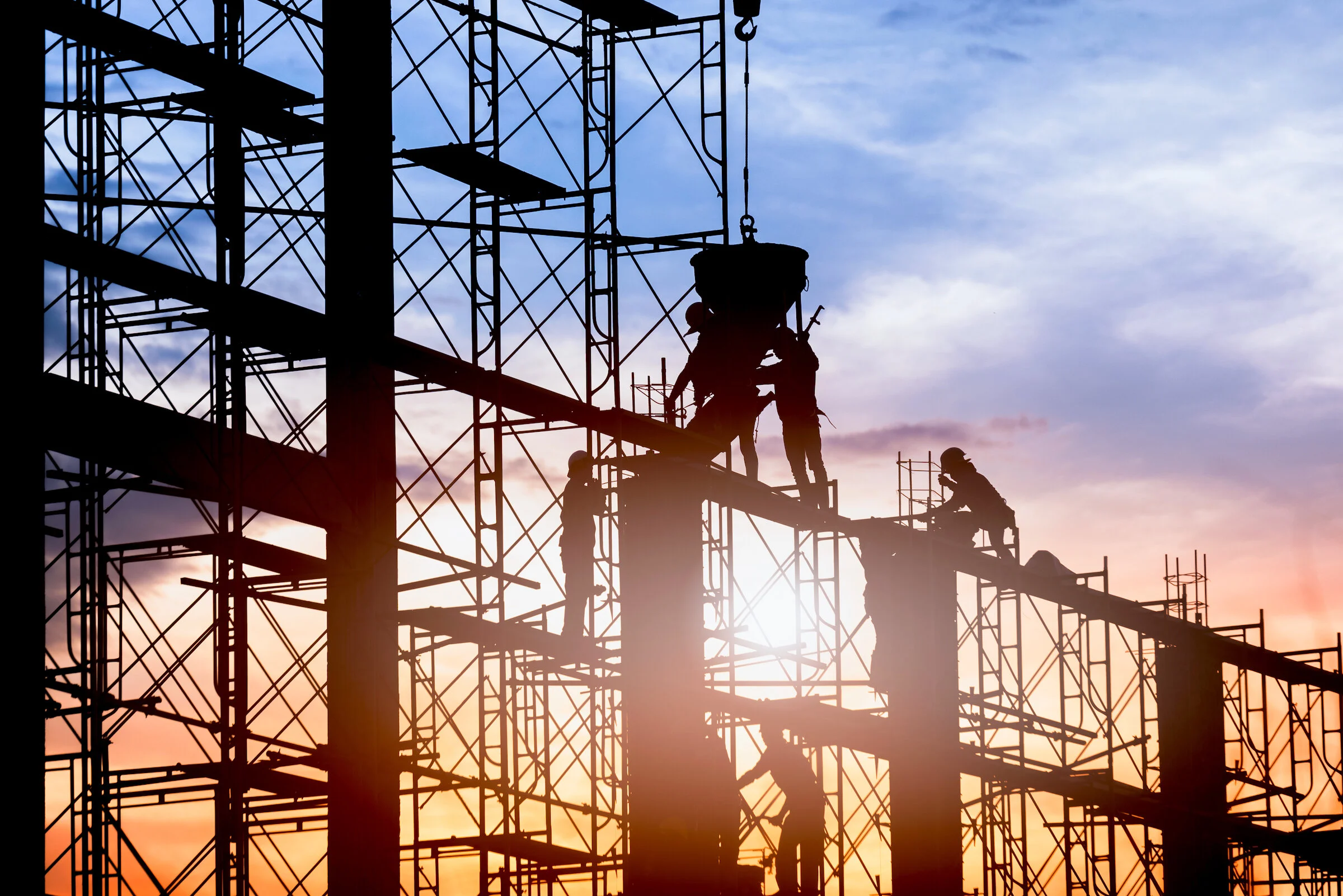 silhouette-worker-construction-building-casting-concrete-work-scaffolding.jpg